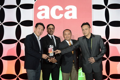 Ali Hamad Al-Sulaiti, Senior Manager, PR, Ooredoo; Bambang Wibowo, MD of Indosat Singapore and Randy Pangalila, Group Head Mobile Financial Services, Indosat collect the Connected Asia Award at the Asia Communication Awards.