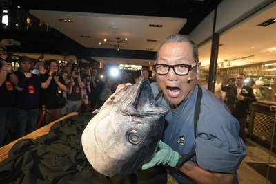 Morimoto Asia, the collaboration of Chef Masaharu Morimoto and Patina Restaurant Group, staged a colorful media opening Tuesday as a dazzling new dining experience at Disney Springs at Walt Disney World Resort. As part of the restaurant’s entertainment, Master Chef Morimoto treated media and VIPs to his precision carving skills, transforming a 100lb Hawaiian big eye tuna to create a 60ft. long maki roll. (Phelan M. Ebenhack, photographer)