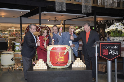 Morimoto Asia staged a media opening Tuesday as a new dining experience at Disney Springs at Walt Disney World Resort. Tuesday’s event at Morimoto Asia featured a Japanese sake ceremony, Master Chef Morimoto was joined (left to right) by Keith Bradford, Vice President Disney Springs, Maribeth Bisienere Senior Vice President Disney Springs, George A. Kalogridis, President Walt Disney World Resort, and Nick Valenti, CEO Patina Restaurant Group. (Phelan M. Ebenhack, photographer)