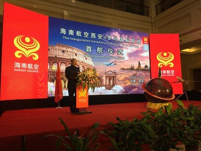 Hainan Airlines chairman Chen Feng delivers a speech at the inaugural ceremony