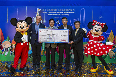 L-R: Mickey Mouse, Chairman and CEO of The Walt Disney Company Bob Iger, Shanghai Charity Foundation Vice Chairperson Song Yi Qiao, China Soong Ching Ling Foundation Vice Chairman Jing Dunquan, Shanghai Children's Medical Center Director Jiang Zhongyi, Minnie Mouse