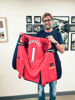 Jürgen Klopp Receives the First Trikot Jackett: A Sports Jacket with the Shirt of Your Favourite Club as the Inner Lining