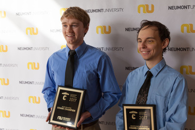 Tyler Berry and Kyle Kacprzynski celebrate as winners of Neumont university's 2017 Capstone Project Invitational. 