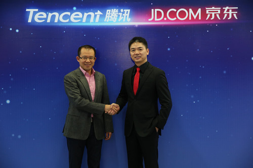 Mr. Martin Lau, President of Tencent (left) and Mr. Richard Liu, founder, Chairman and CEO of JD.com Inc (right).  (PRNewsFoto/JD.com)
