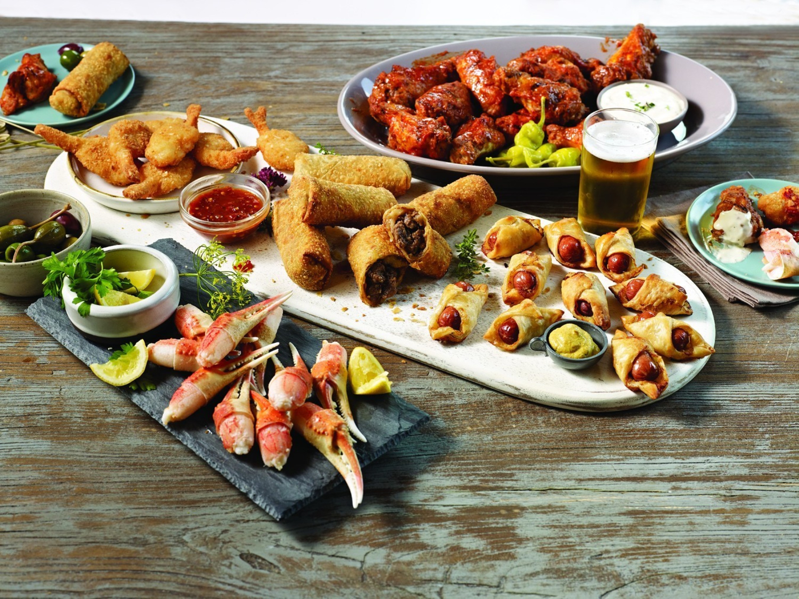 These apps from Omaha Steaks are so good, some folks might not even remember the game! This collection of gourmet favorites includes some of our finest World Port Seafood - sweet, crispy Coconut Shrimp and rich cracked Snow Crab Claws - along with plenty of our perfect Buffalo Wings and world-famous Franks in a Blanket. And, try this - the incredible, cross-cultural flavor of Omaha Steaks Filet Mignon Spring Rolls. What game?