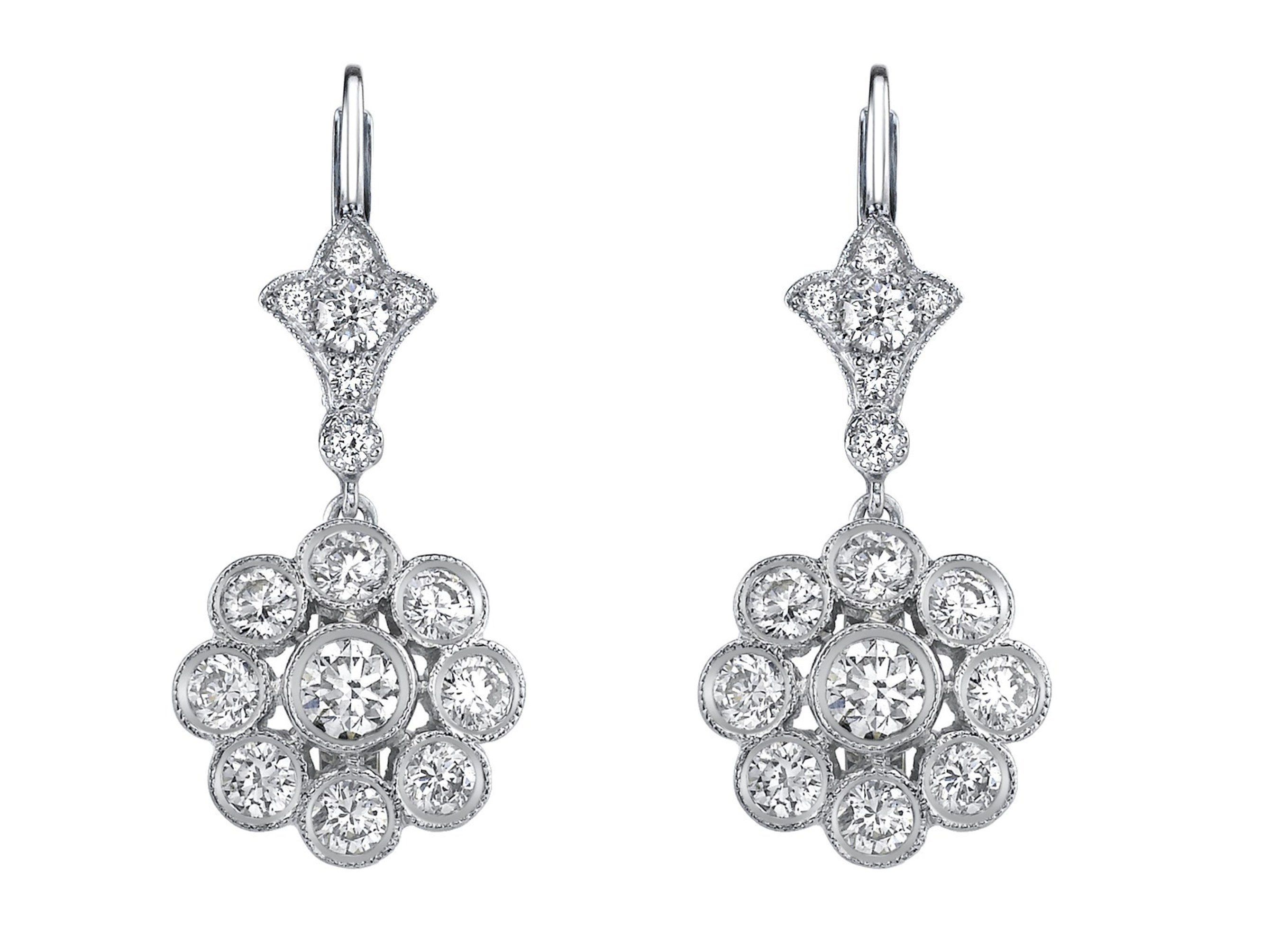 Diamond and platinum flower earrings set with 30 round brilliant-cut diamonds from a fleur-de-lis diamond top. Hand crafted, signed and designed by Neil Lane.