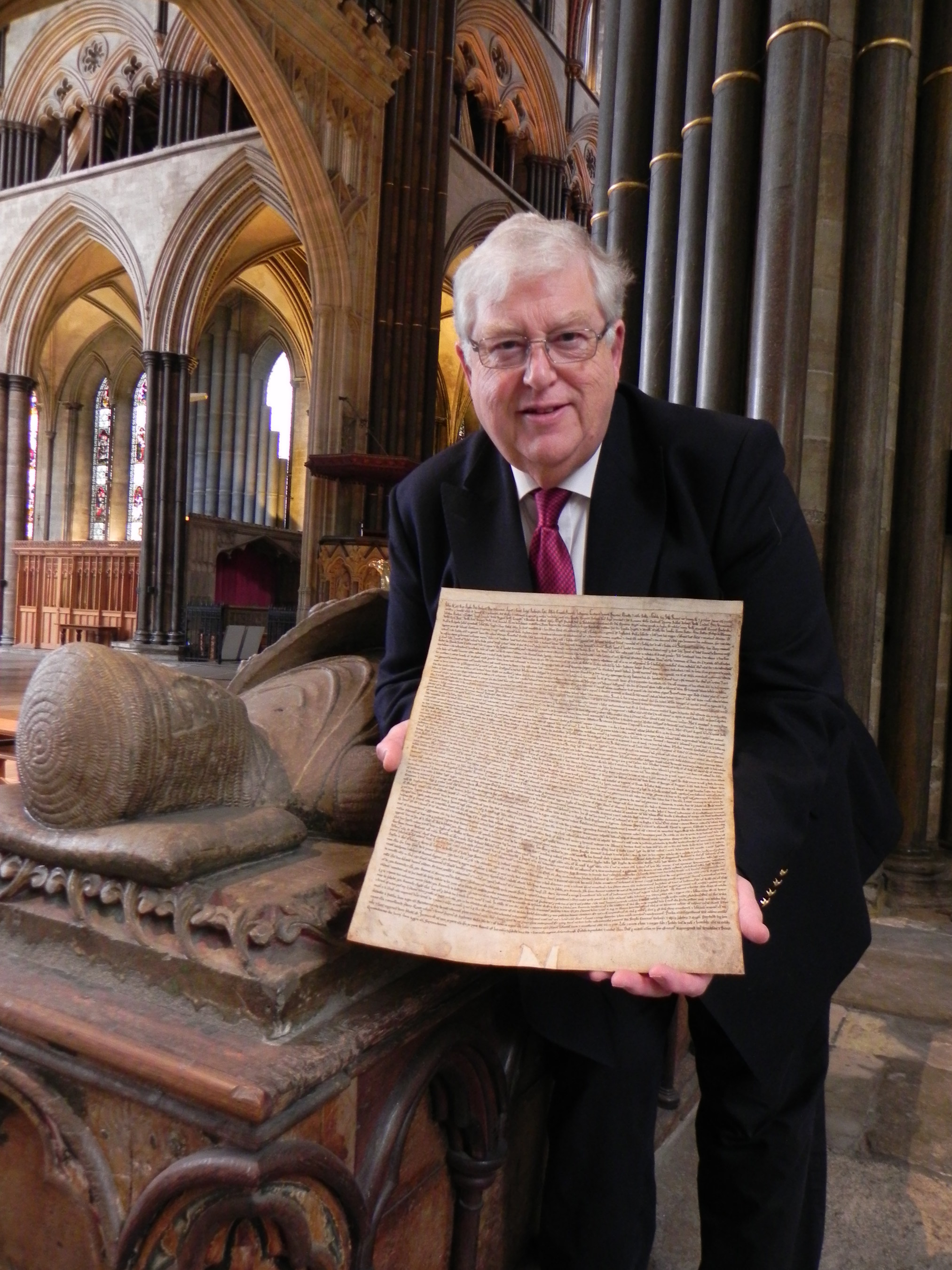 Robert Key with the Magna Carta copy at Salisbury Cathedral, at the tomb of William Longspee, half-brother of King John, who was at Runnymede on 15 June 1215. He was Earl of Salisbury and he was the first person to be buried in Salisbury Cathedral.