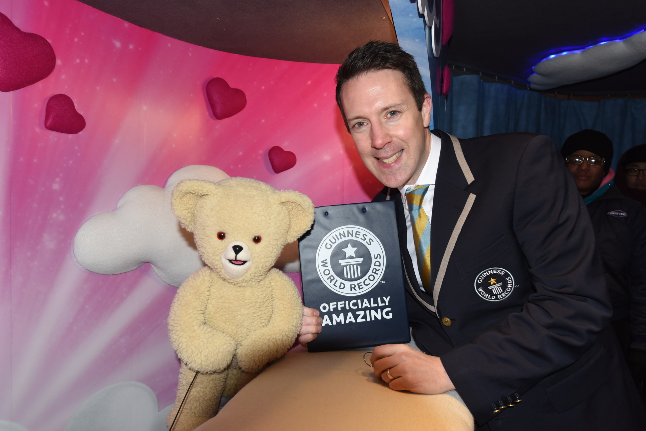 Snuggle Bear attempts to set the GUINNESS WORLD RECORD for the most hugs in 8 hours with 5,000 hugs.