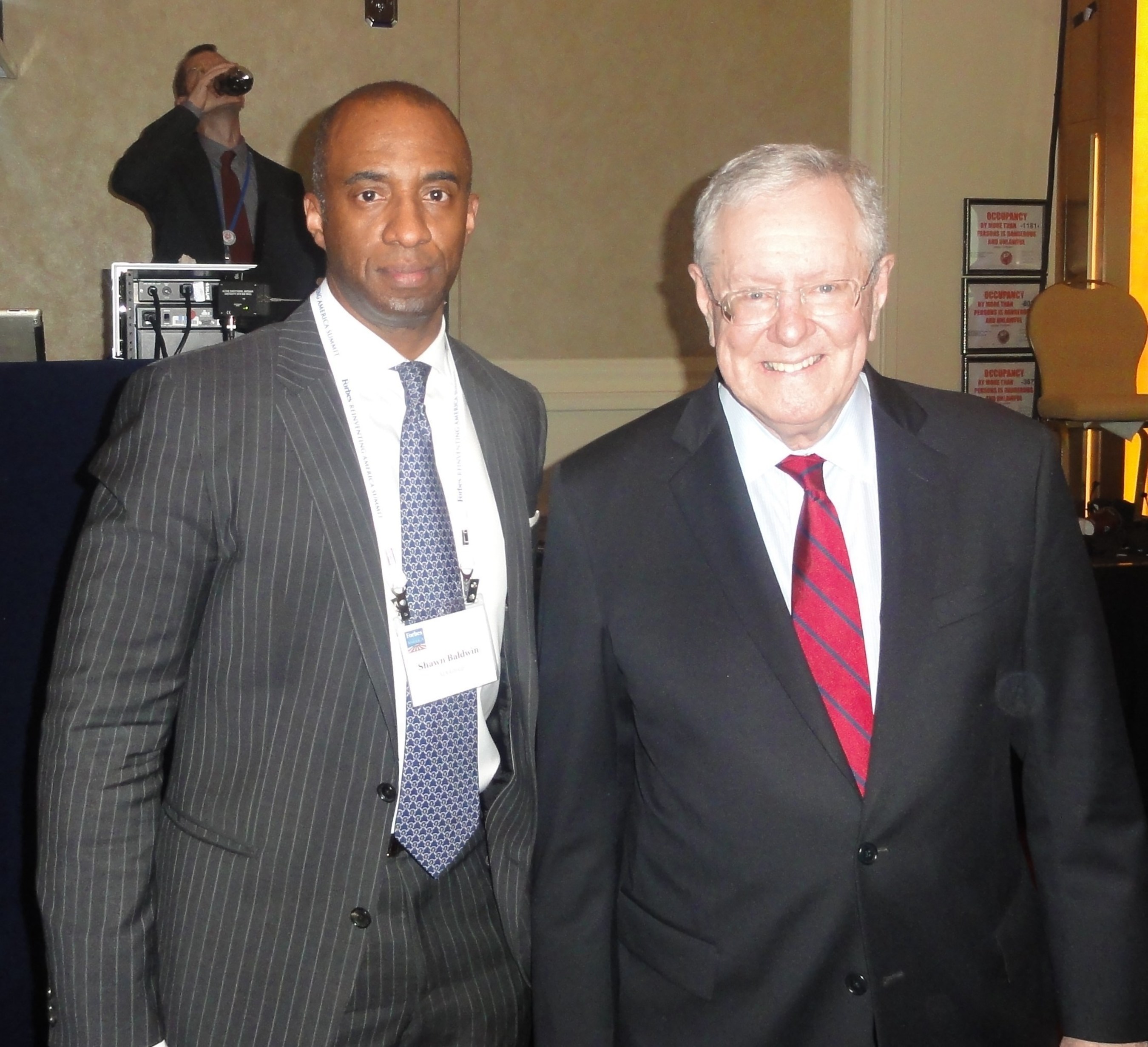 Shawn Baldwin, Chairman of AIA Group, with Steve Forbes, Chairman and editor-in-chief of Forbes Media at the 2015 Forbes Reinventing America Summit.