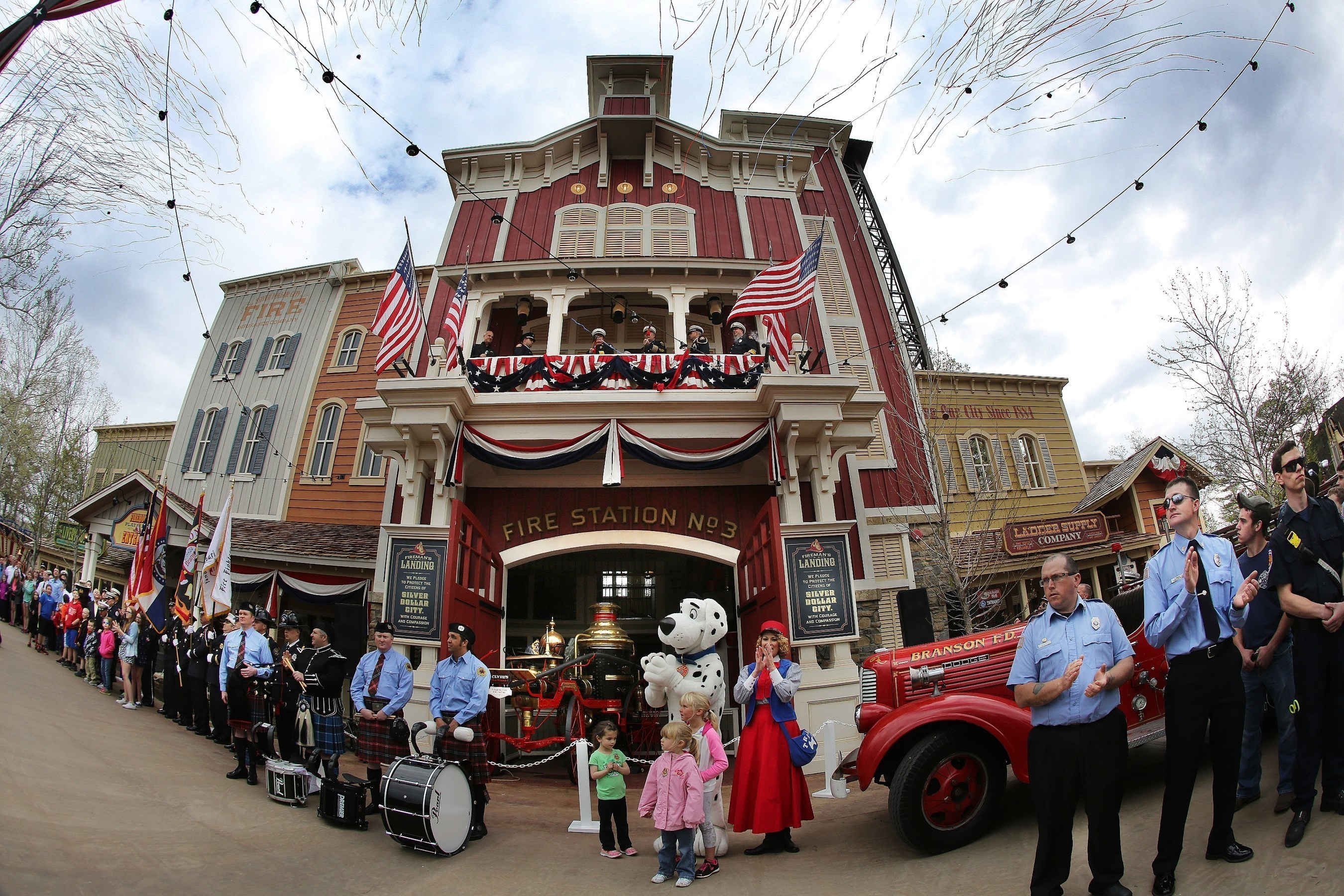 Hundreds of firefighters from around the country gather for the grand opening of Fireman's Landing, a new $8 million area at Silver Dollar City in Branson, Missouri.