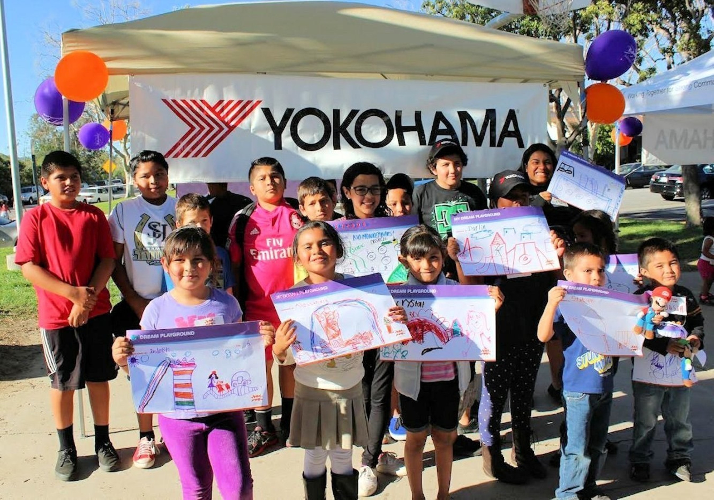 Kids at Green Park in San Juan Capistrano, CA drew pictures to help design their new playground being built by Yokohama Tire and KaBOOM!