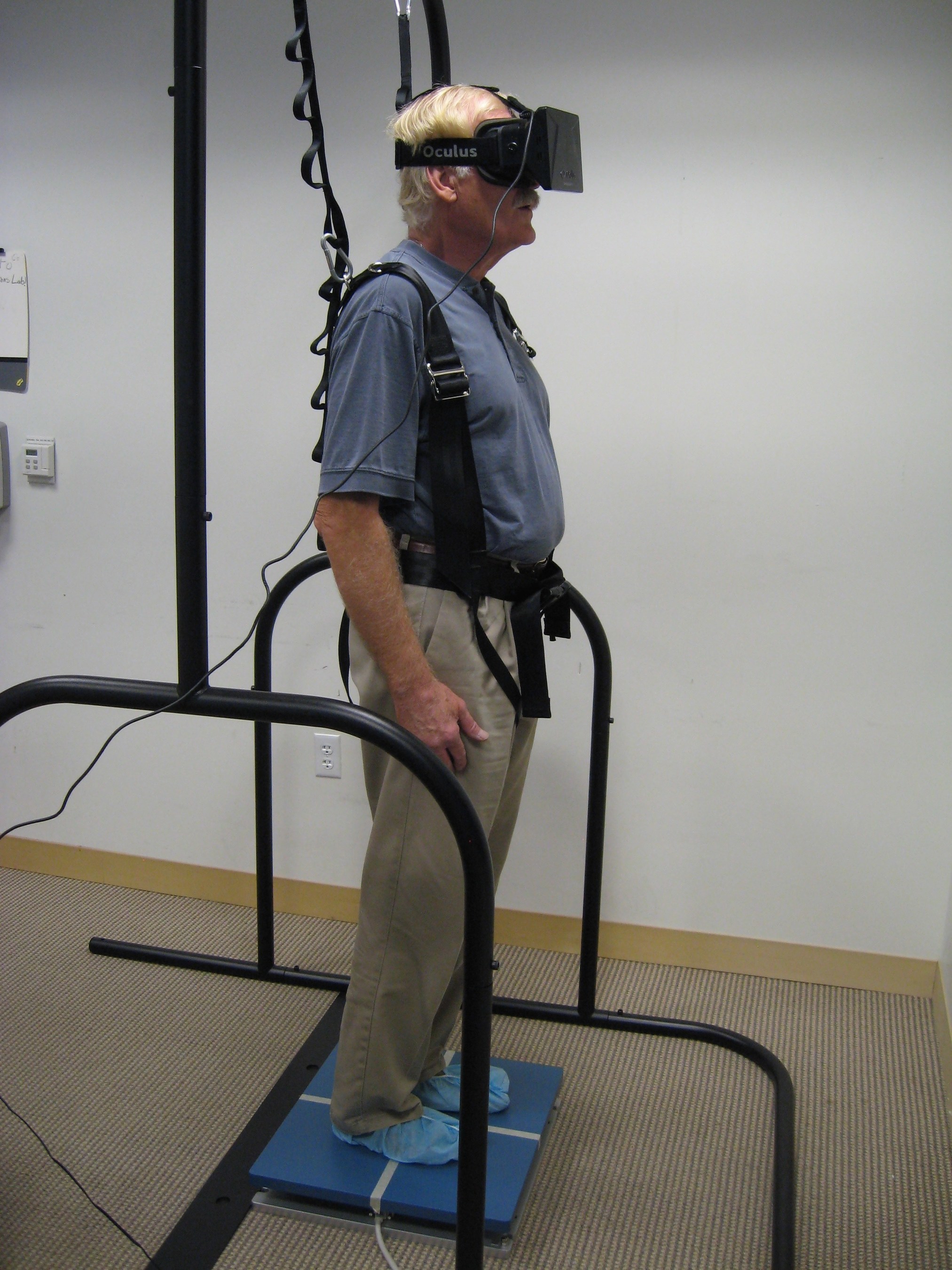 Patient being evaluated with the newly developed virtual reality-based balance assessment test at the University of California San Diego Visual Performance Laboratory.