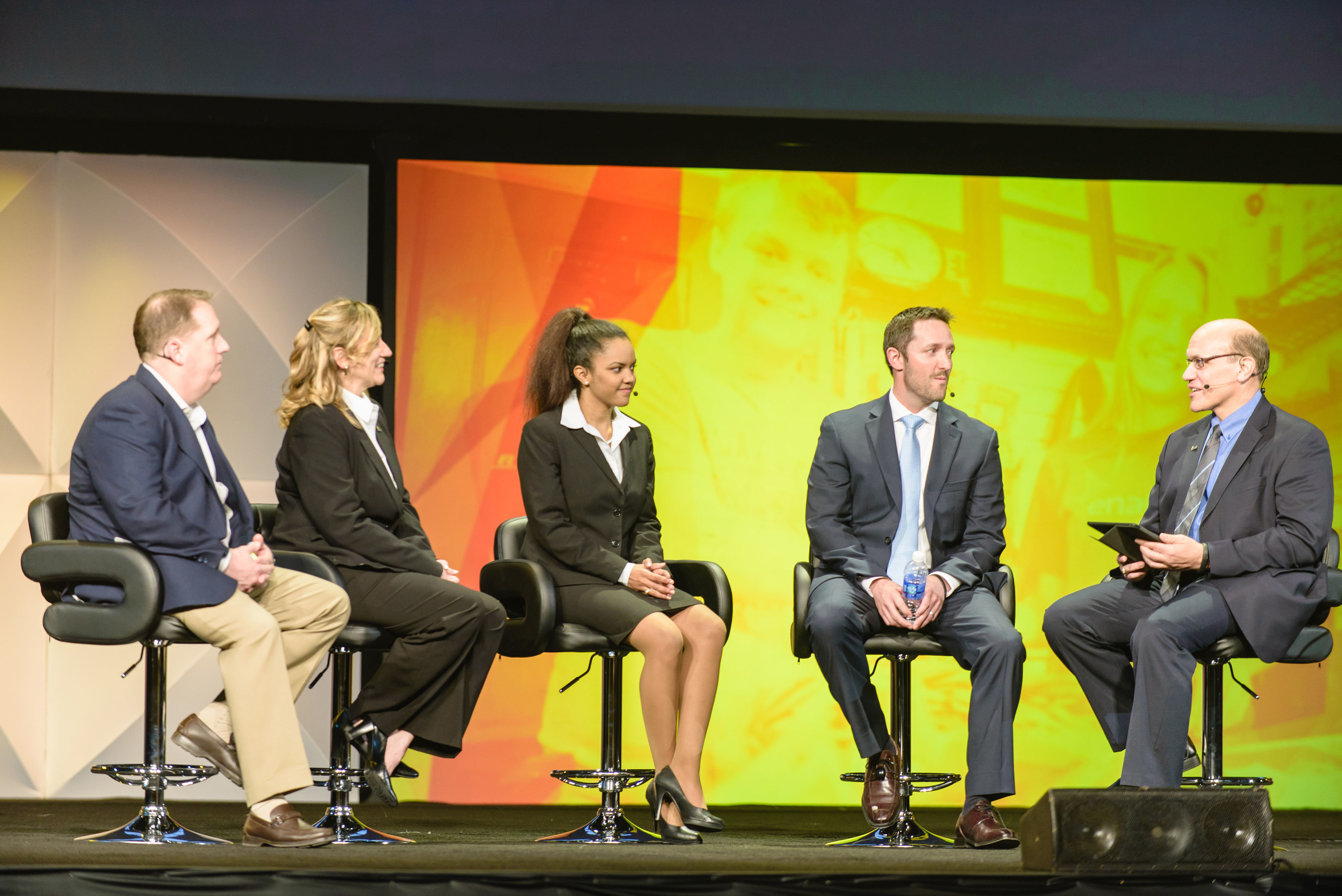 Members discuss opportunities to network and collaborate at the Enactus United States National Exposition Opening Round Ceremony. (L to R) Mike Moore: Chairman, Enactus United States National Advisory Board, EVP and President of Small Formats for Walmart US, Walmart Stores, Inc.; Cynthia Wood; Chelsea Watkins; Tim Clow; Alex Perwich: President, Enactus United States