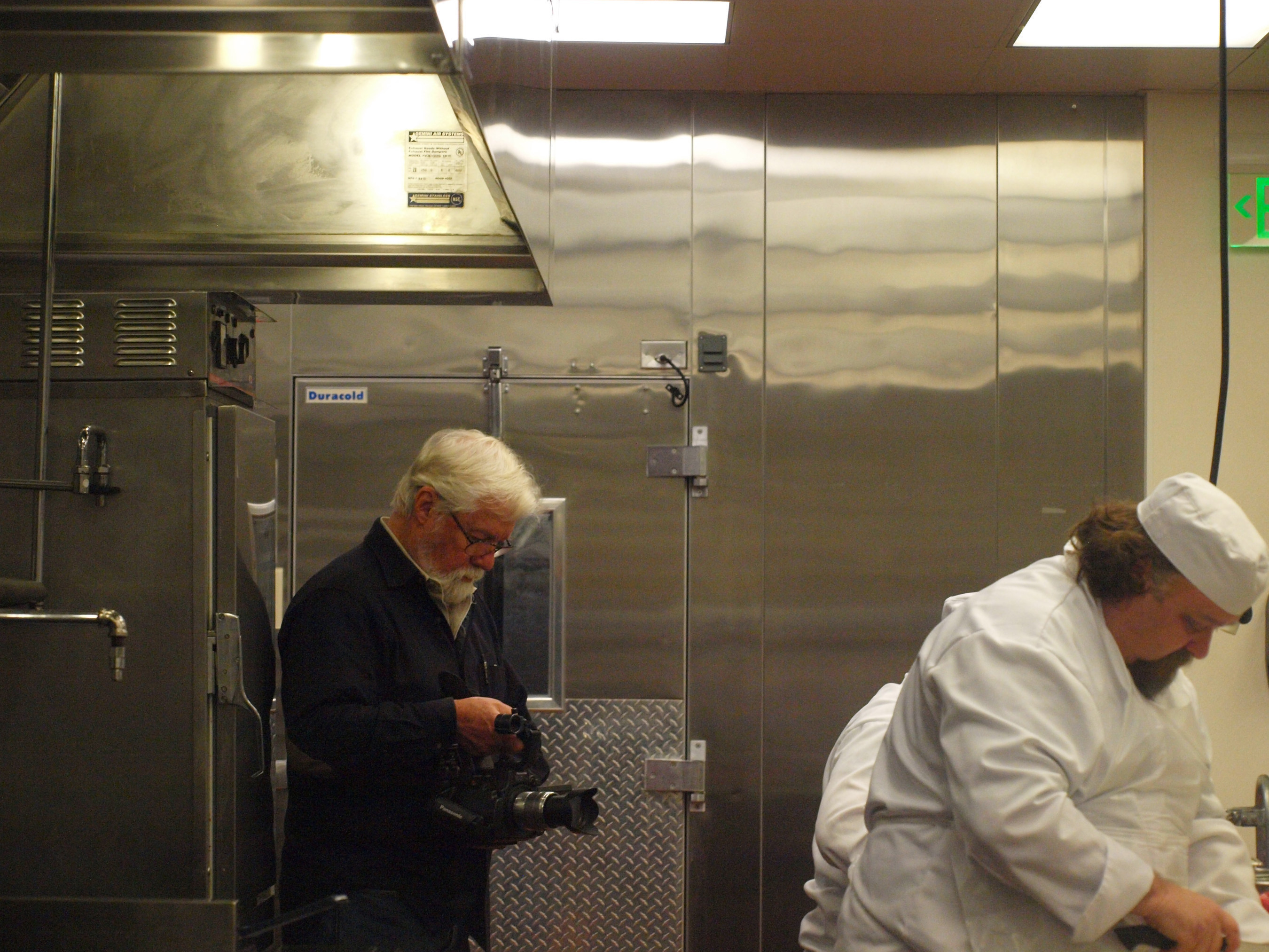 Oscar-winning Director John Korty, homeless adults learning job skills at Homeward Bound's Fresh Starts Culinary Academy