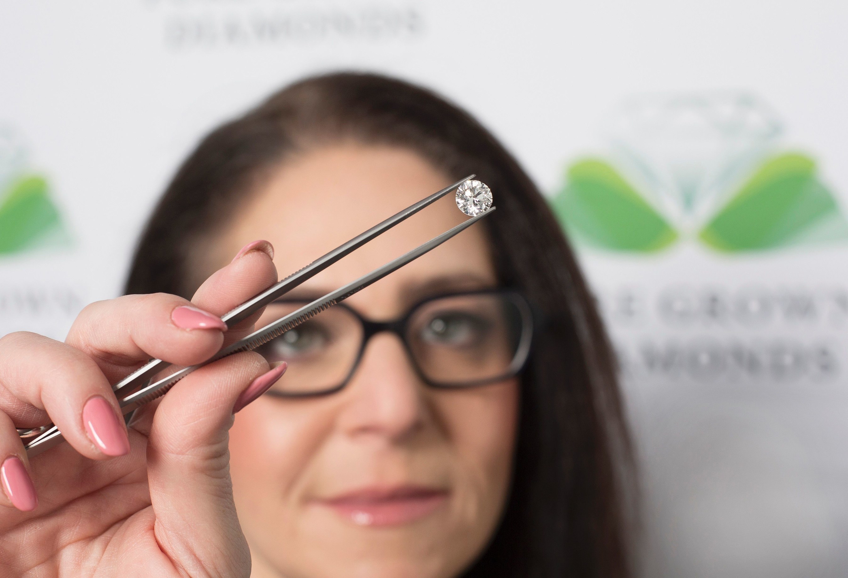 Pure Grown Diamonds President & CEO Inspects Clarity and Cut of World's Largest Lab-Cultivated Diamond.