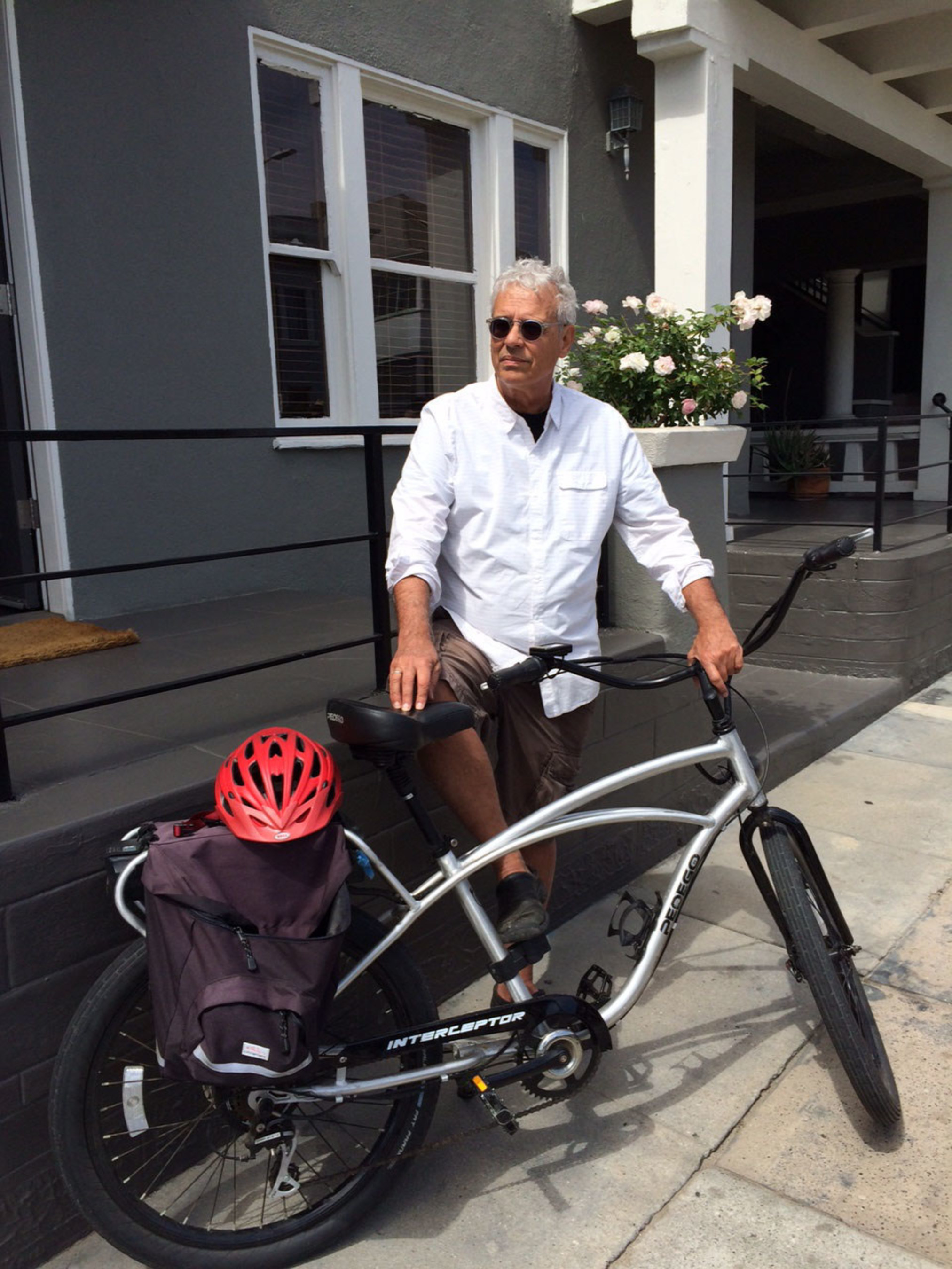 Bill Borden, 63, a producer of more than 35 films including the High School Musical series, Desperado and La Bamba, commutes to work on his Pedego Interceptor, allowing him to enjoy daily exercise, sunshine and fresh air while avoiding stress from traffic and limited parking.