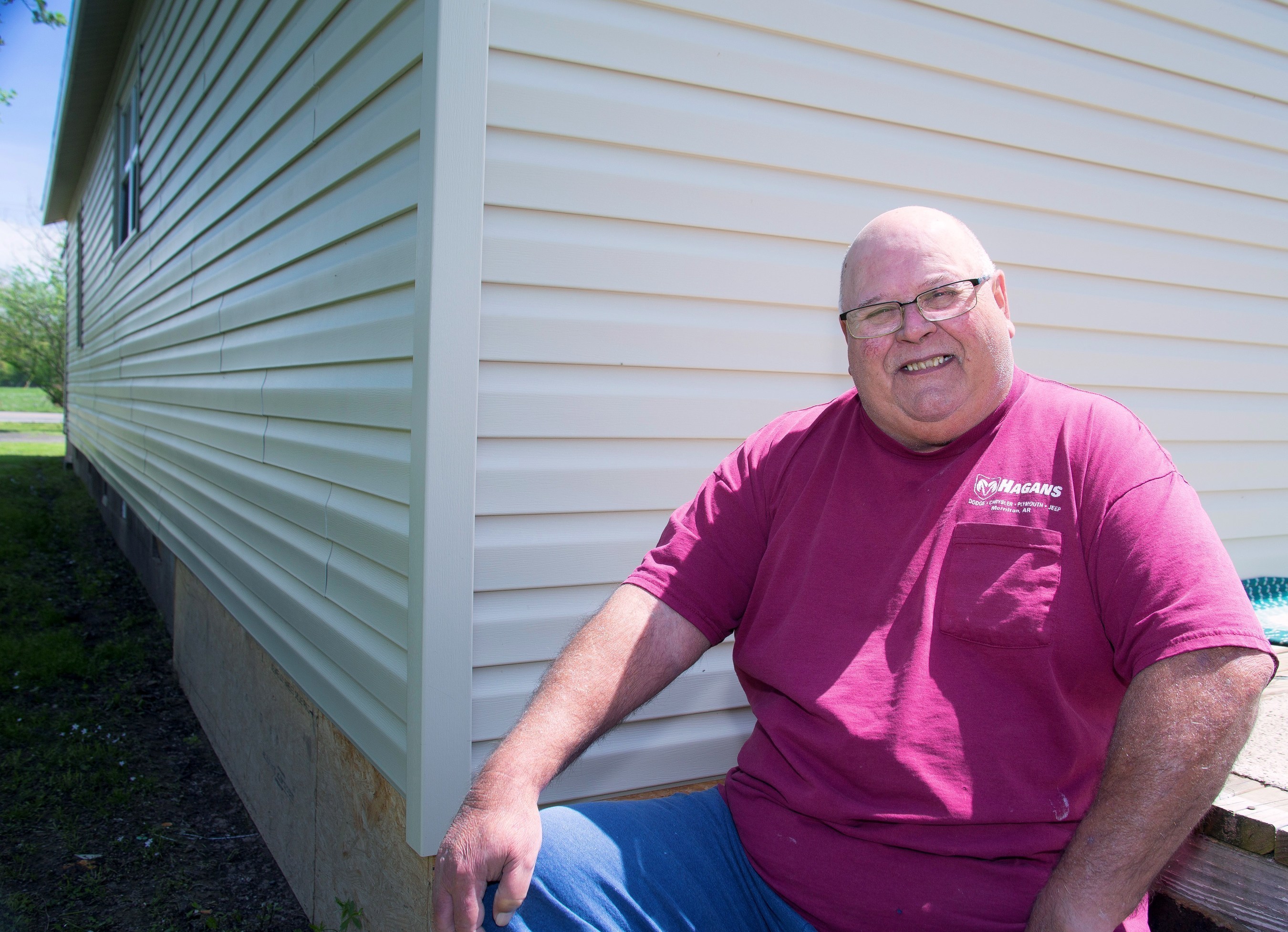 Kenneth Hinkston's home in Atkins, Arkansas received a new roof and new siding with the help of a Special Needs Assistance Program (SNAP) grant from River Town Bank and the Federal Home Loan Bank of Dallas. For information about SNAP grants, contact River Town Bank.