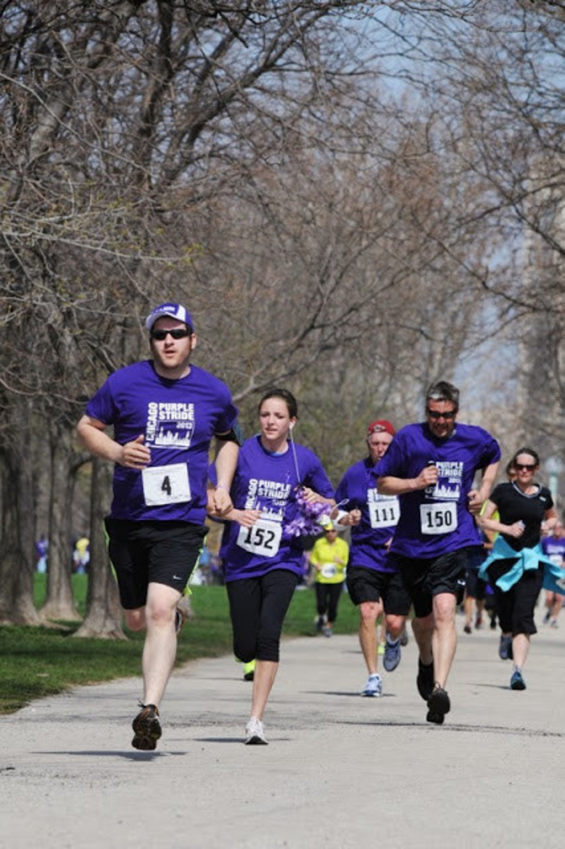 Past PurpleStride Chicago runners participating in the 5K run