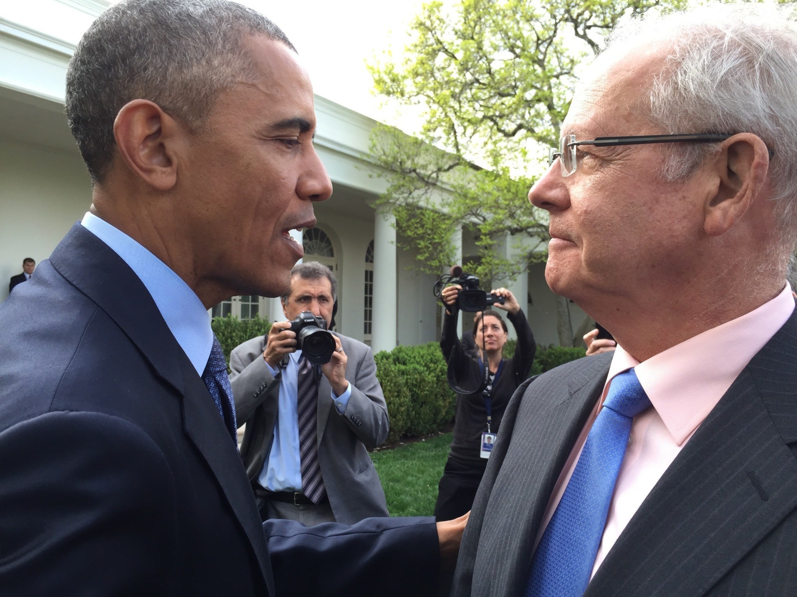 President Barack Obama and David W. Parke II, M.D. (pictured right), CEO of the American Academy of Ophthalmology, at ceremony celebrating the enactment of the overwhelmingly bipartisan law reforming Medicare physician pay yesterday." (Photo credit: Saul Levin, M.D.)