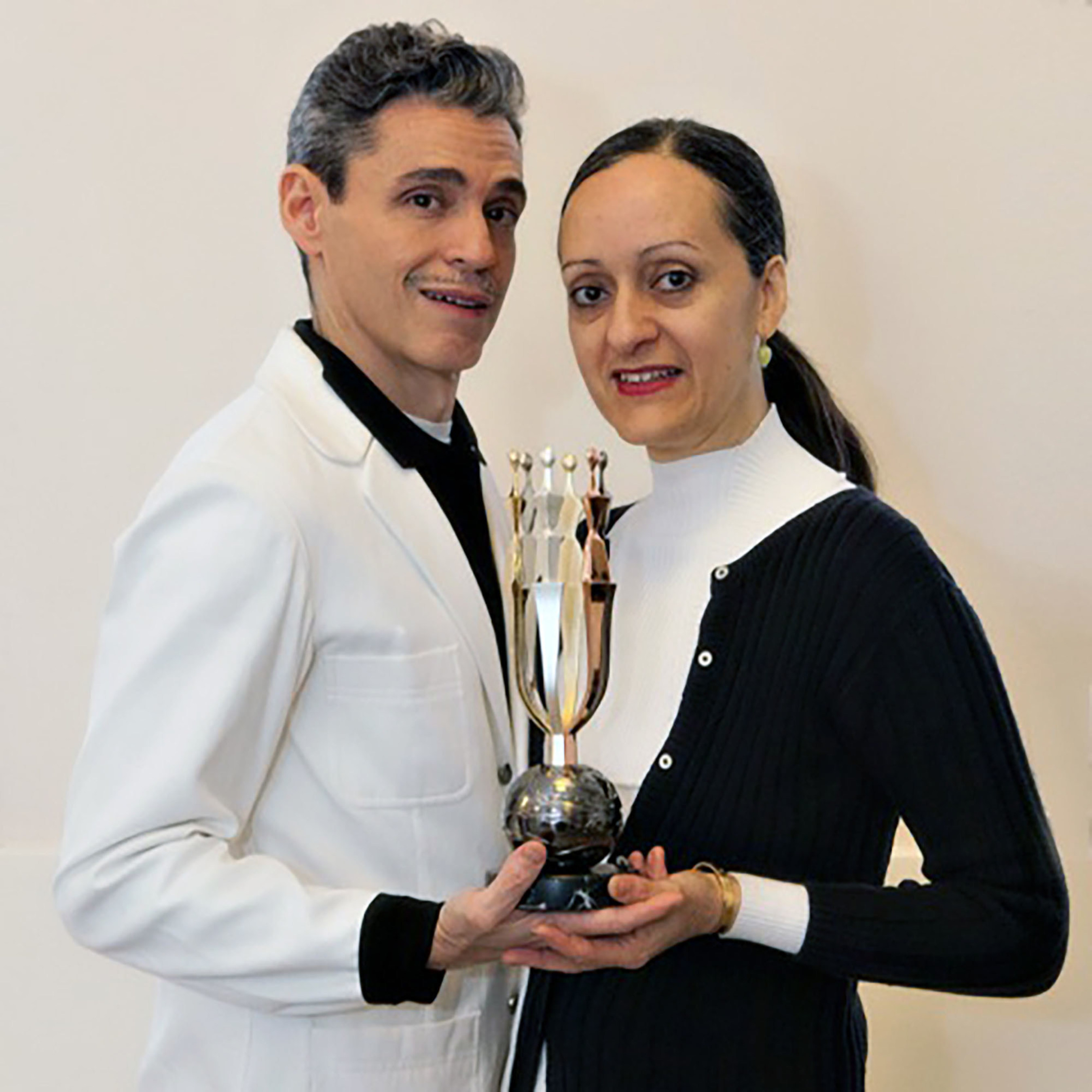 Artist Ruben Toledo and Designer Isabel Toledo with the new AAFA American Image Awards statuette.