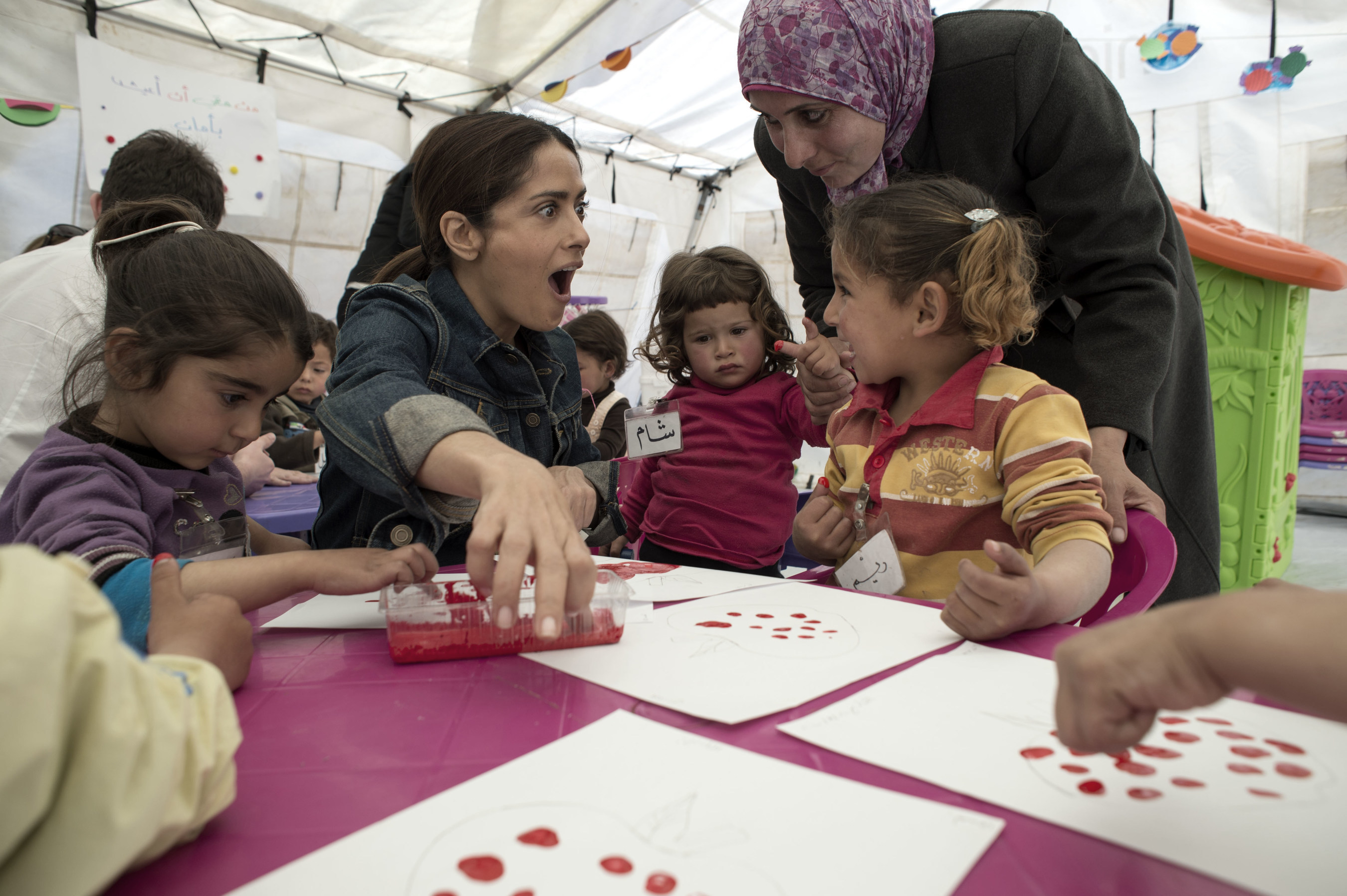 UNICEF supporter and CHIME FOR CHANGE campaign Co-Founder Salma Hayek meets with Syrian refugee children and aid workers who are providing a safe environment through counselling, play and learning activities. On April 25, Hayek visited Syrian refugees in Lebanon's Bekaa Valley with UNICEF to draw attention to the urgent humanitarian needs of children and families in the region, and to launch Gucci's CHIME for the Children of Syria fundraising appeal.