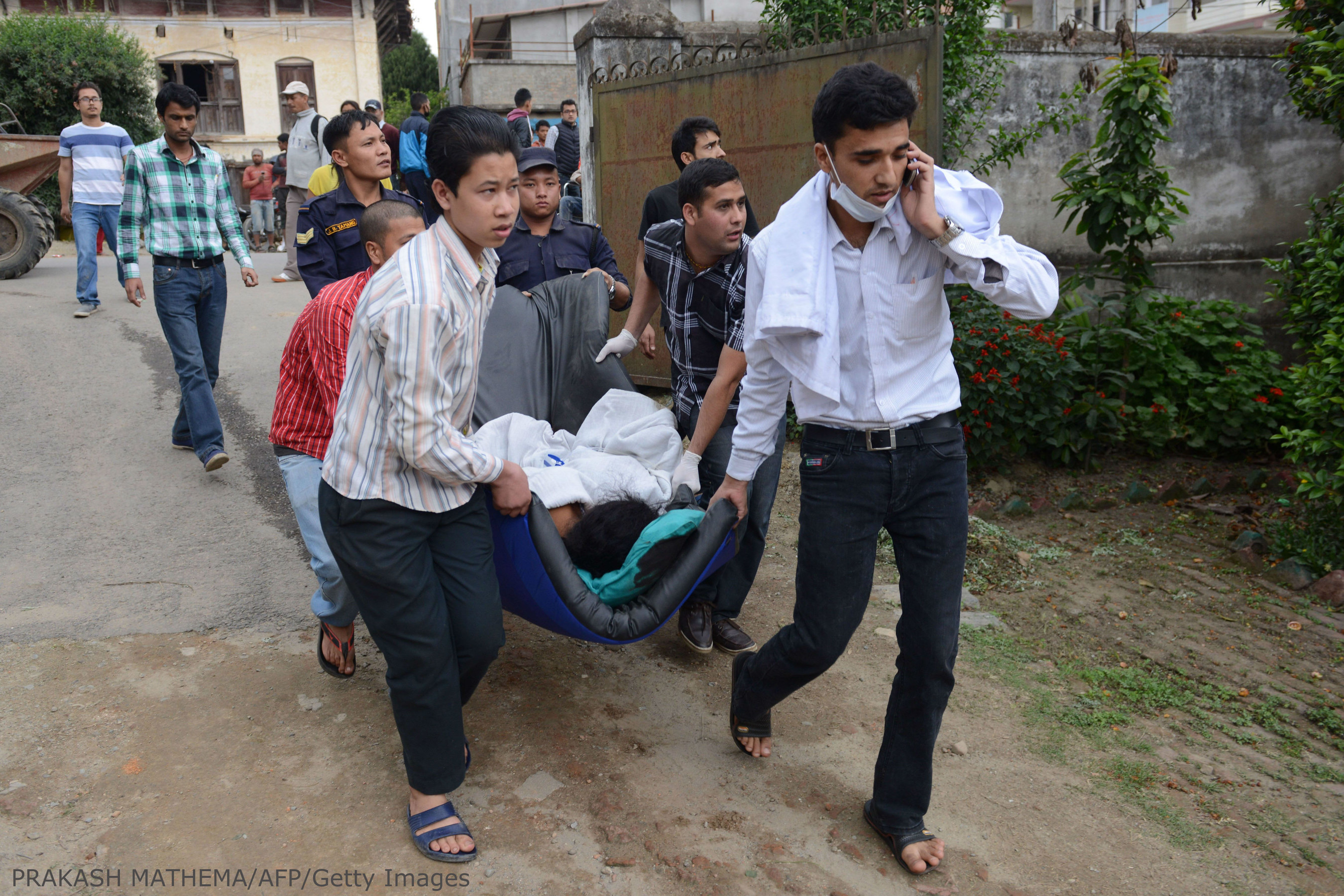 Nepal earthquake victims rushed to medical centers.  Save the Children response teams are on the ground.