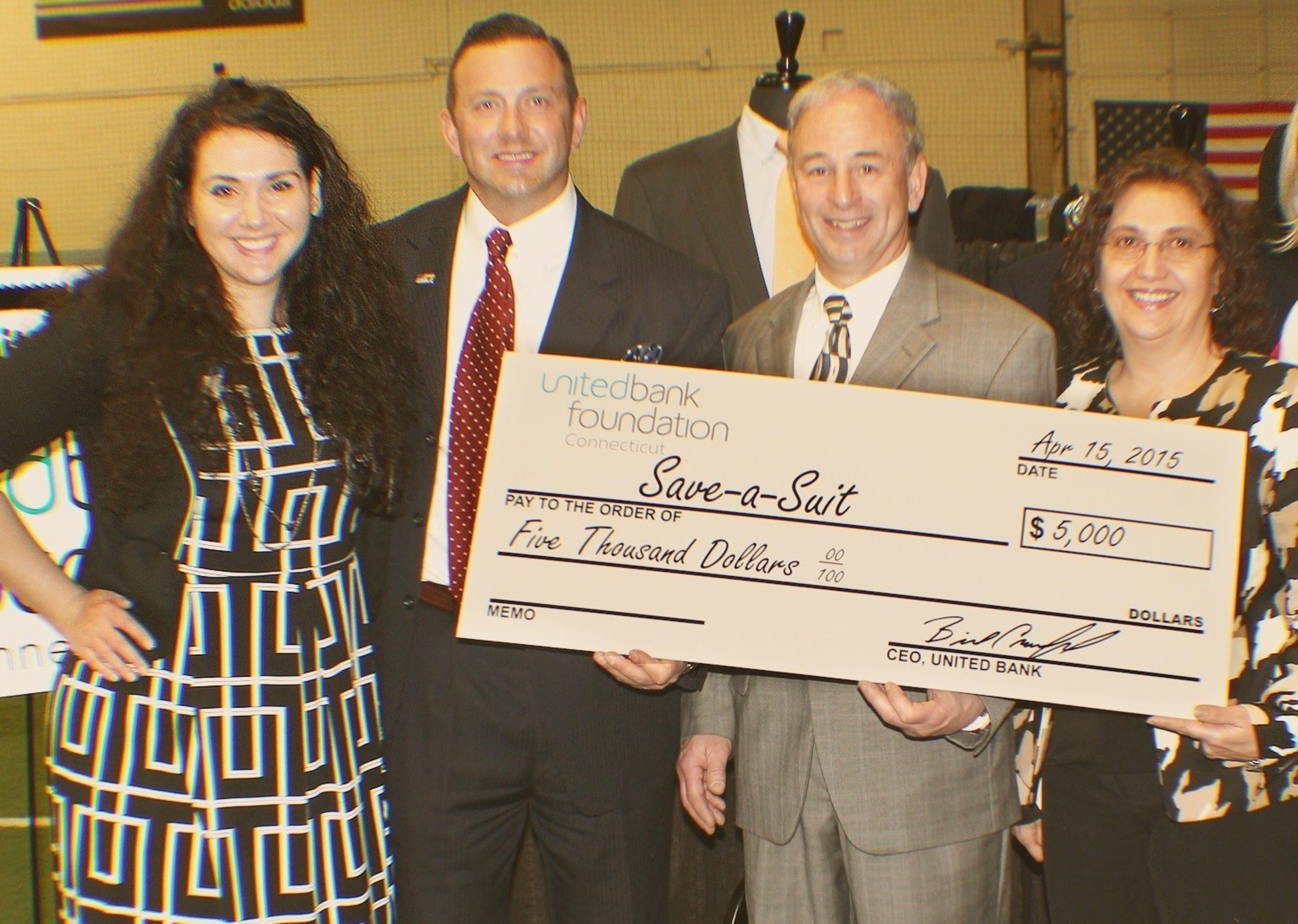Pictured Left to Right are: Jessica Ewud, Executive Director, Save-A-Suit and Scott Sokolowski, President & Founder, Save-A-Suit accepting United Bank Foundation Connecticut's $5,000 donation from Bill Earley, Relationship Manager at United's Hamden, Conn. office and Dolores Bitz, Vice President and Cash Management Officer at United.