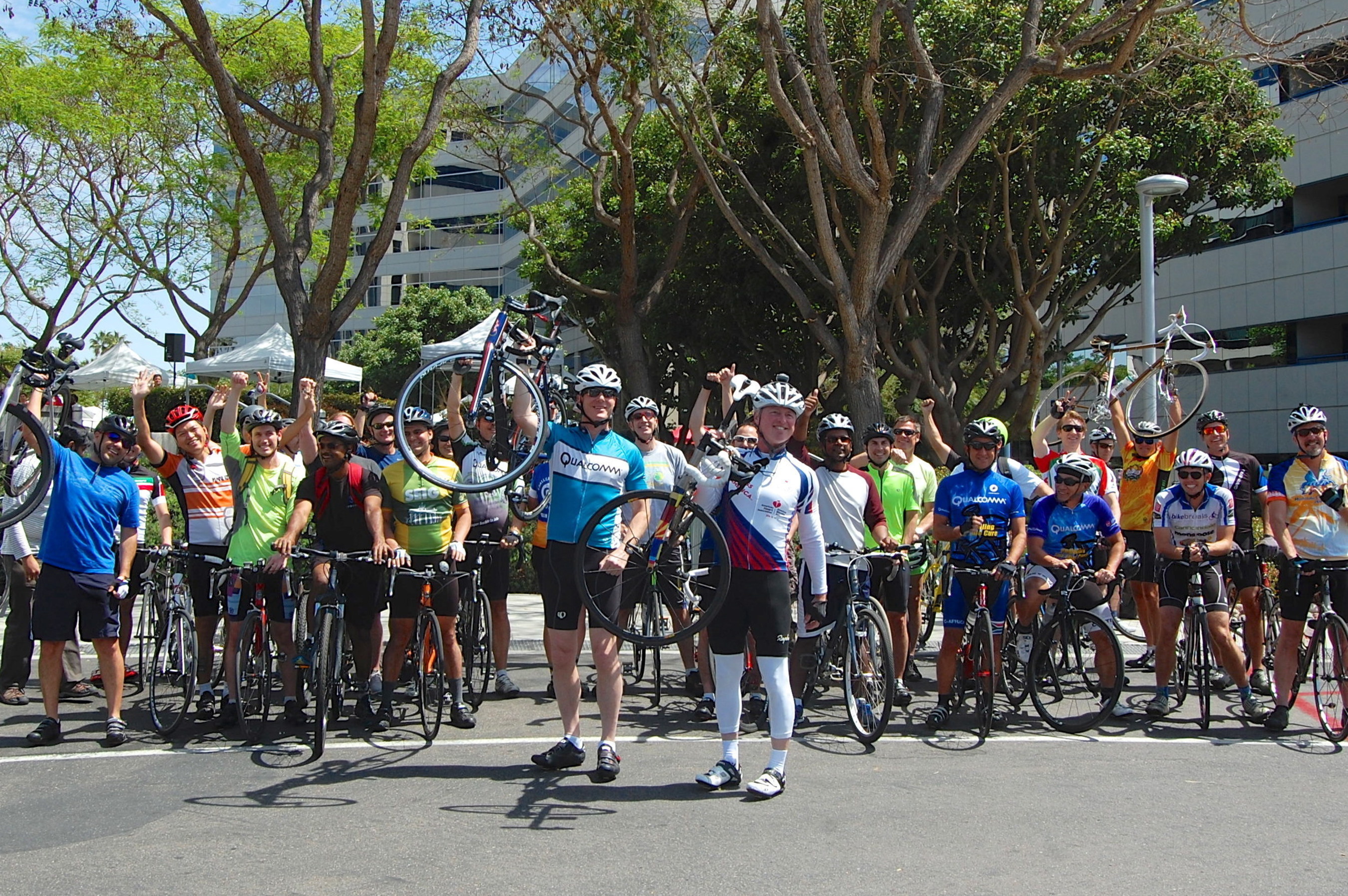 Qualcomm Executive Chairman Paul Jacobs (Center Front Left) and Qualcomm employees set out to ride with Sean Maloney (Center Front Right) in San Diego, CA on April 3rd, 2015. Photo: Amy Brennen, Heart Across America.