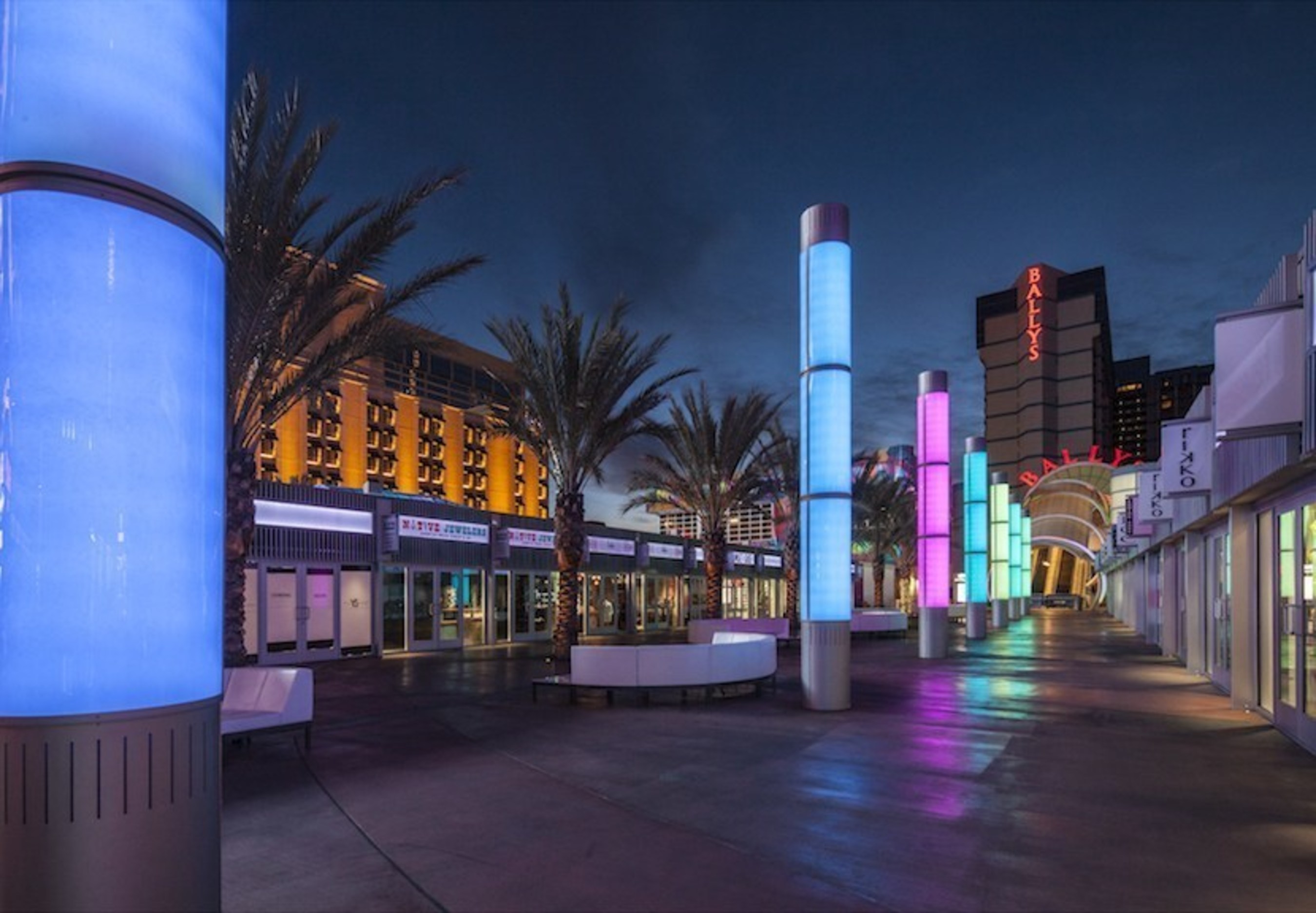 YESCO fabricated the tall cylindrical color changing light posts that line the open plaza space in the center of the project.