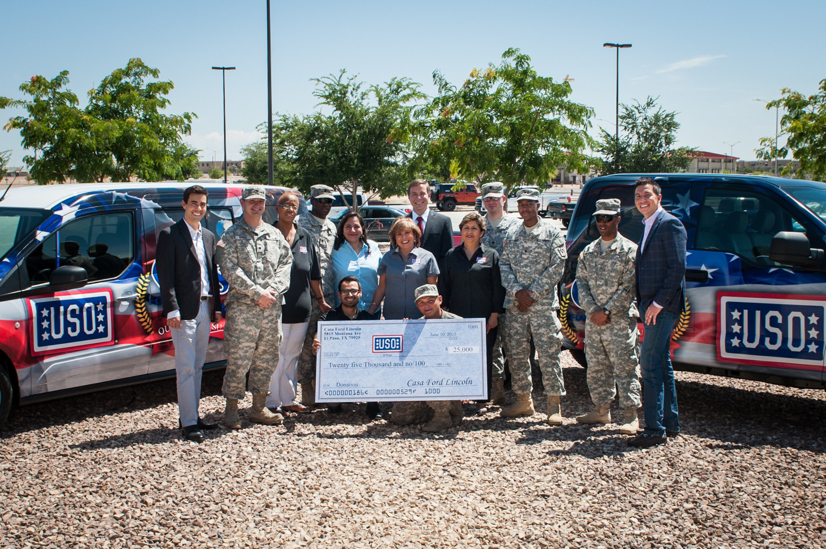 USO staff and service members receive $25,000 donation and custom wrapped vehicles from Casa Ford Lincoln. Photo by Armando Martinez Photography
