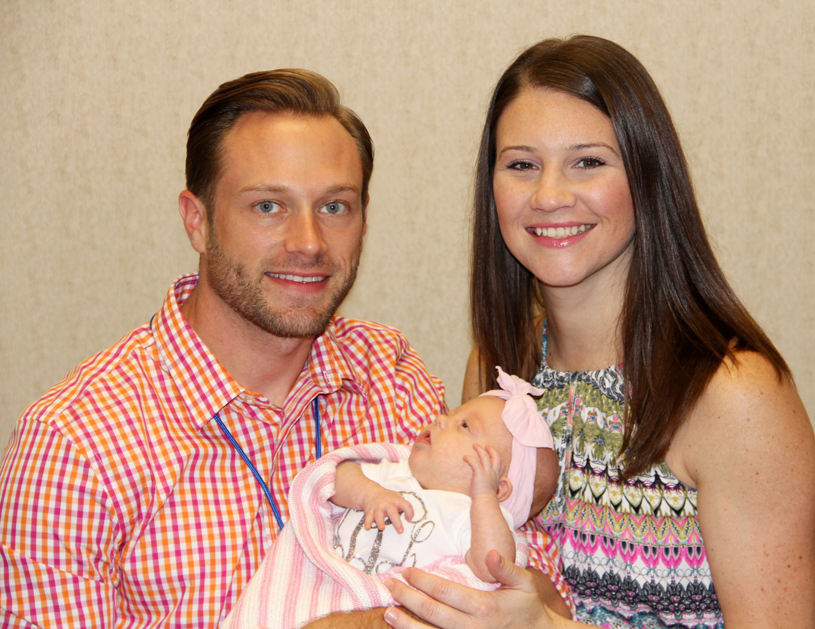 Parents Adam and Danielle Busby take Ava Lane home today.