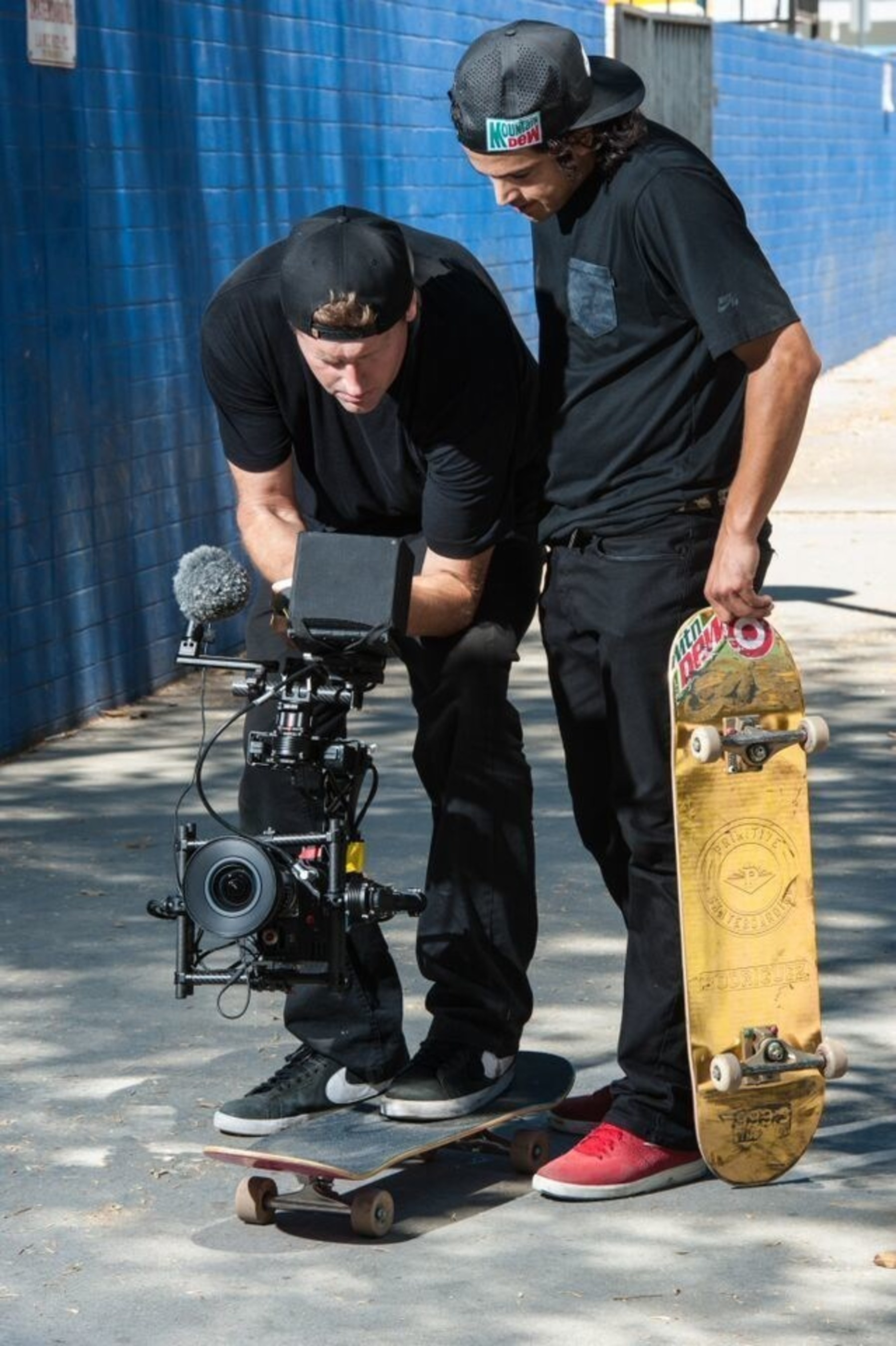Director Ty Evans and professional skateboarder Paul Rodriguez review footage on the set of WE ARE BLOOD, a film produced by Mtn Dew Green Label Films in association with Brain Farm that celebrates the universal bond created by the simple act of skateboarding.