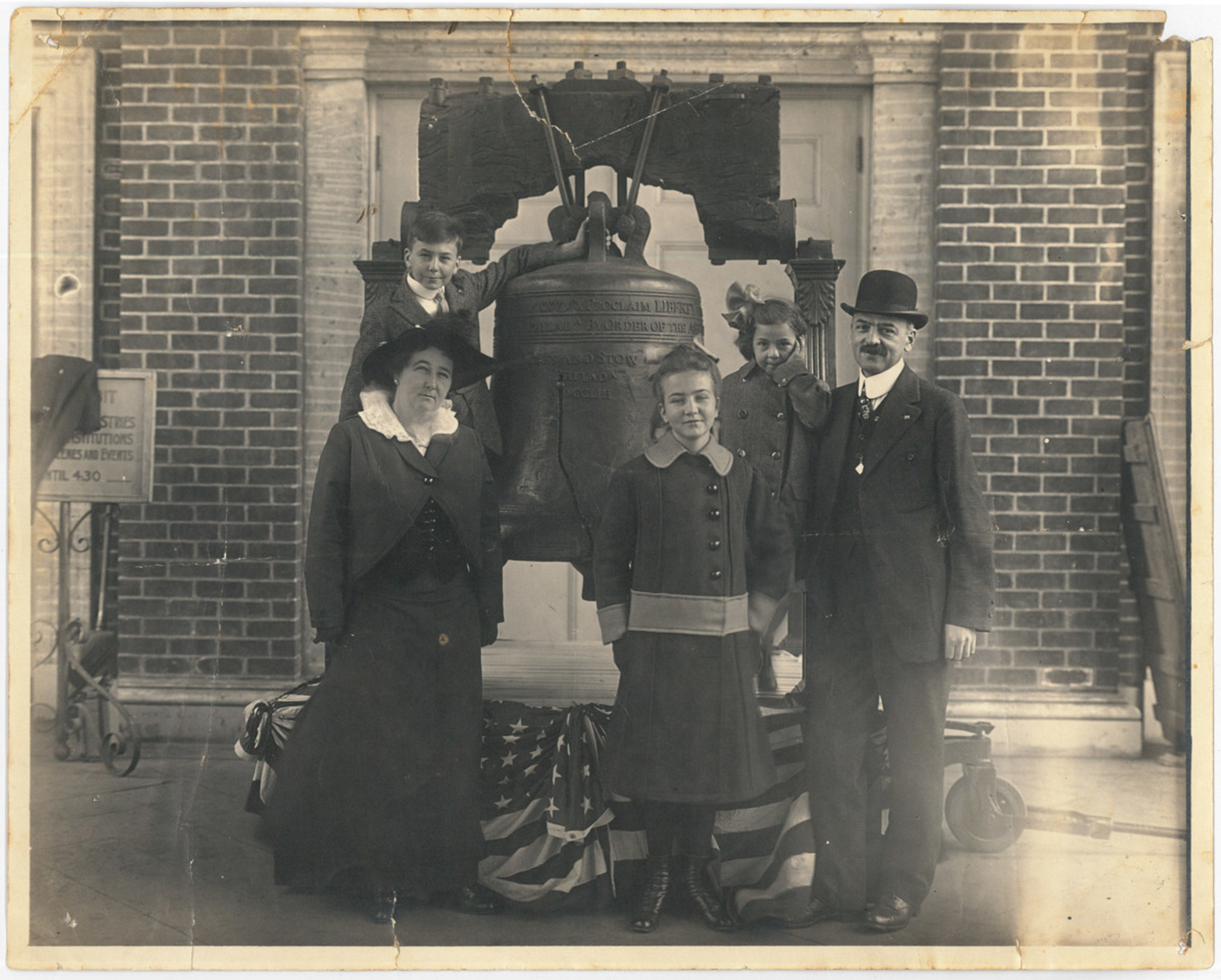 Angelo Joseph Rossi family clustered around the Liberty Bell.