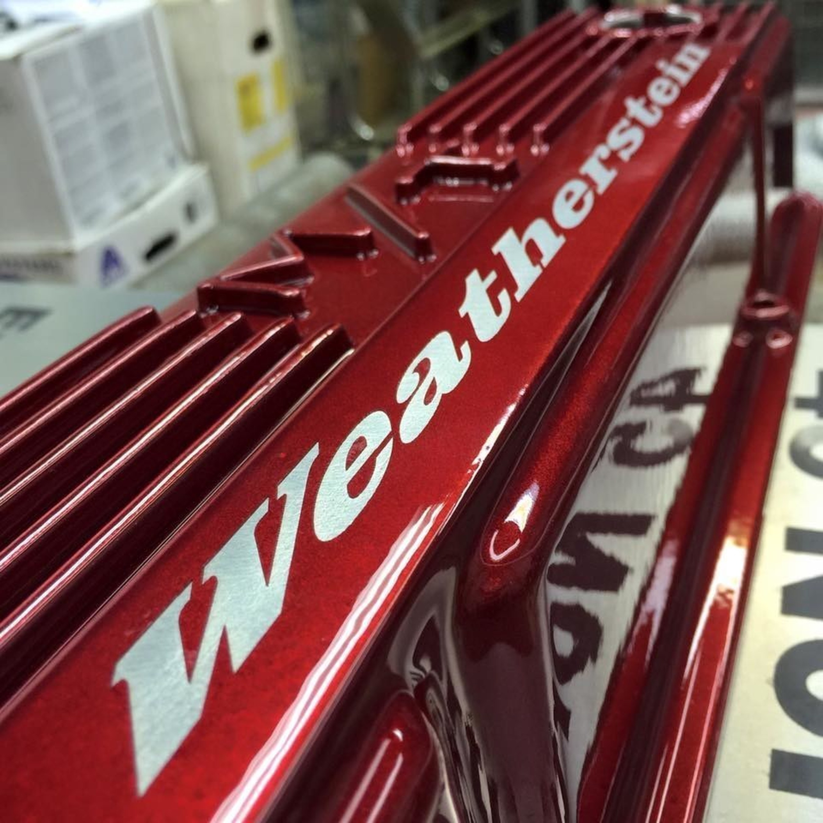 AP LAZER engraved a customers name on their candy red valve cover - photo courtesy of Powder Coat Finishes, LLC