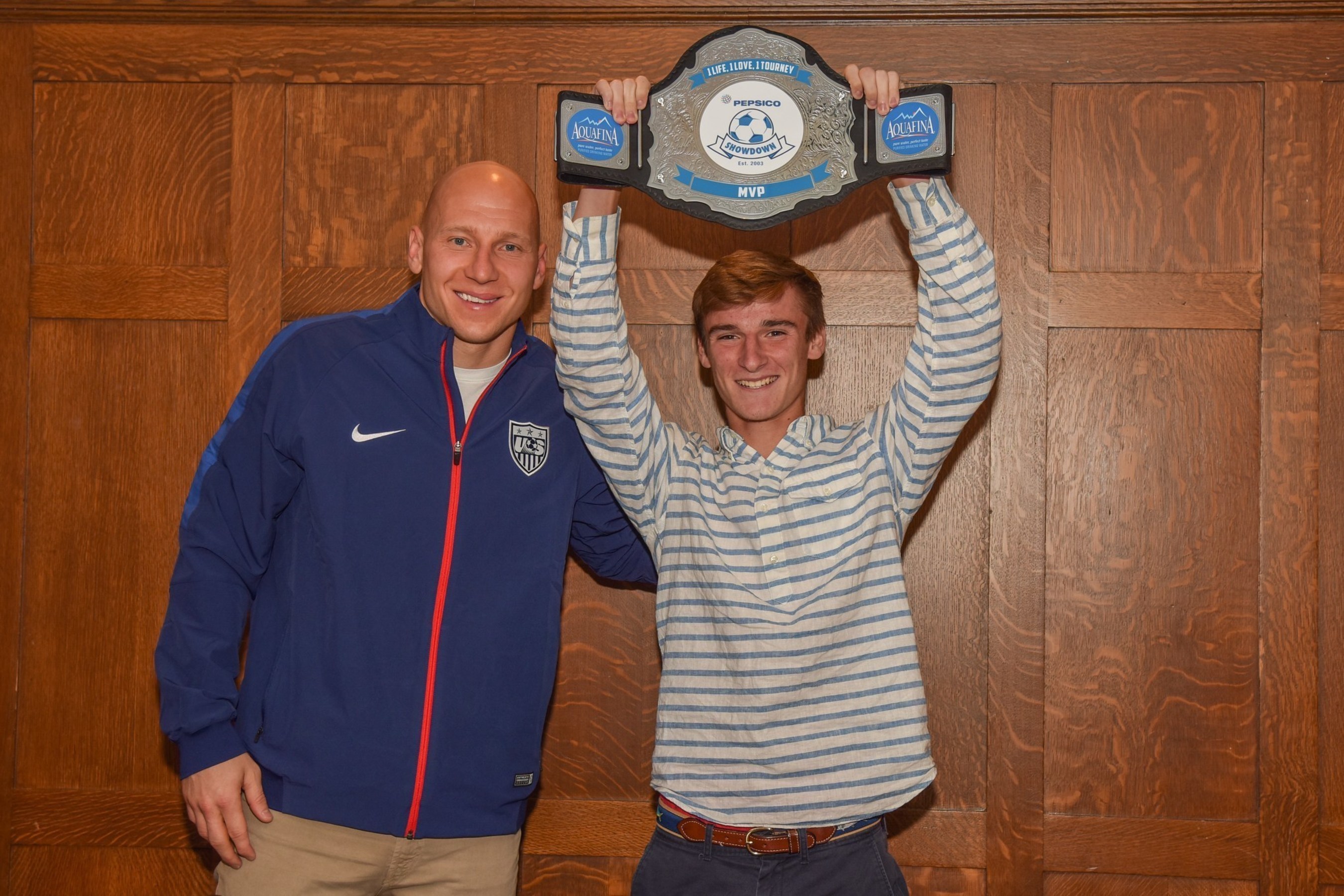 U.S. Men's National Team and Aston Villa starting goalie Brad Guzan (left) presented the 12th Annual PepsiCo Showdown MVP Belt to Lyons Township's Nick Economou after popping in and surprising him during study hall on Wednesday morning in Chicago.