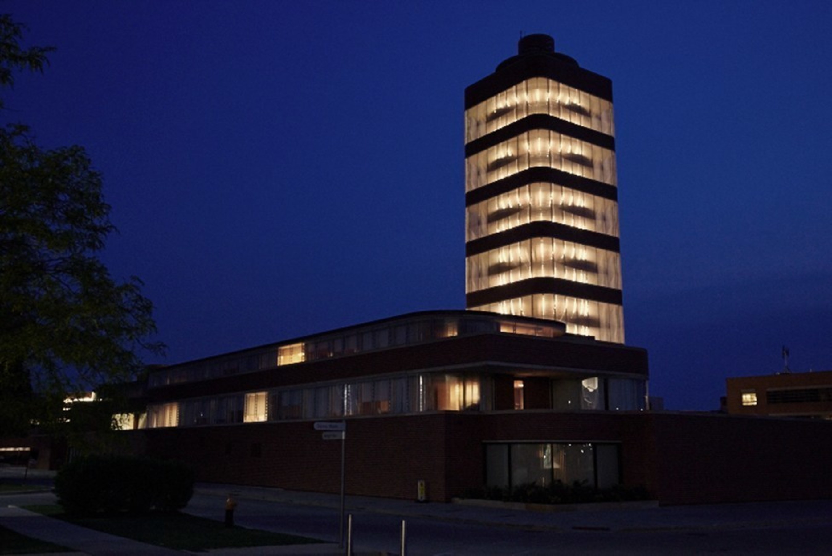 SC Johnson's research tower in Racine, Wisconsin, designed by Frank Lloyd Wright, lit up in the night sky