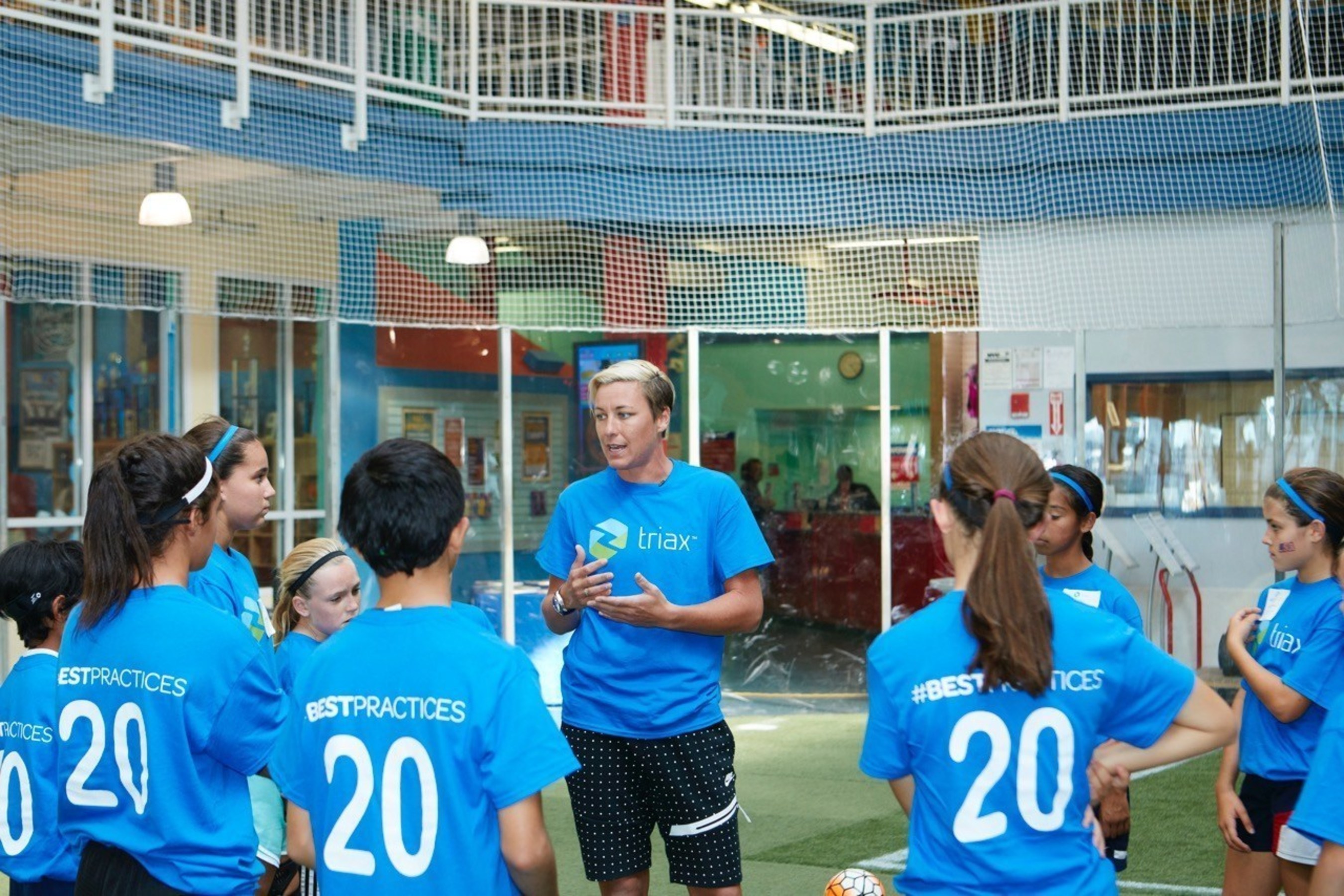 Abby Wambach discussing safety technique during Triax Tec #BestPractices training session.  Triax today announced partnership with IBM Watson Ecosystem as part of concussion research and safety for players.