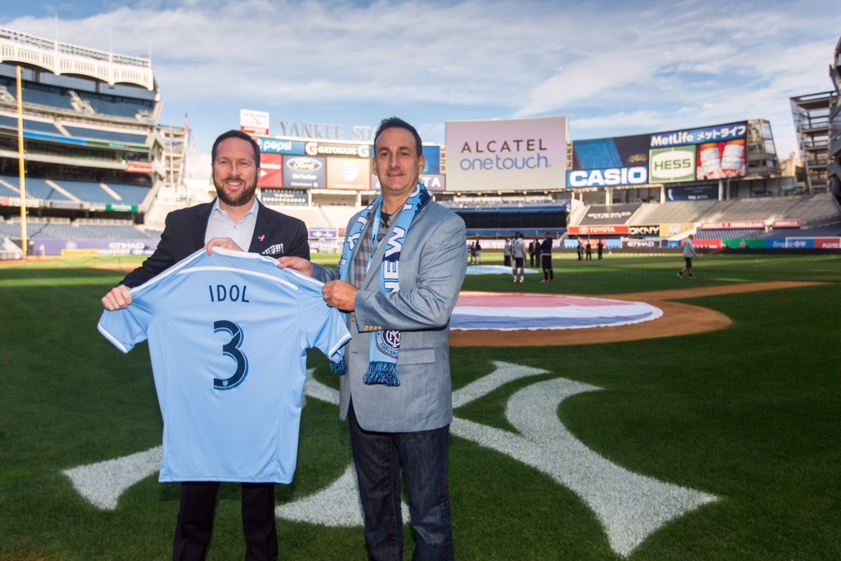 Steve Cistulli, Senior Vice President & General Manager of North America for ALCATEL ONETOUCH and Tom Glick, President of New York City FC announce ALCATEL ONETOUCH as the Official Smartphone Partner of New York City FC at Yankee Stadium on Sunday, October 25, 2015.
