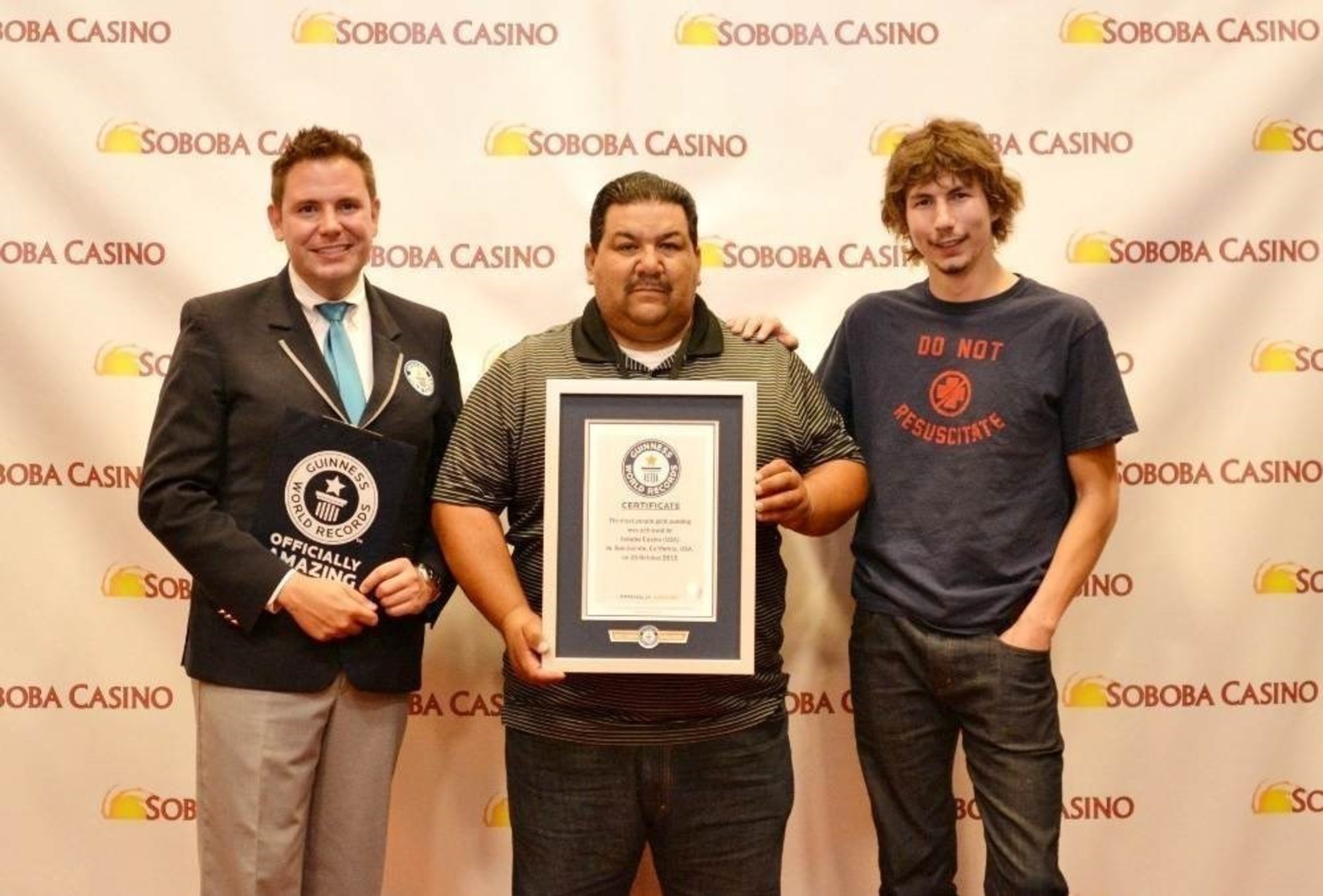 Guinness Book of world Records Michael Empric, Vice-Chair of Soboba Band of Luiseno Indians Tribal Council Isaiah Vivanco, and Star of Discovery Channel's Gold Rush Parker Schnable celebrate breaking a "Golden" World Record.