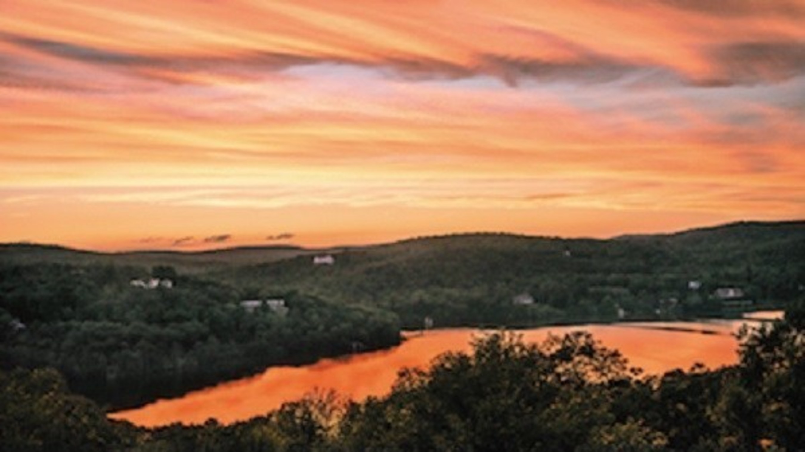 Tuxedo Park: The Gift of Nature, Orange sky over Tuxedo Park, pages 48 and 49