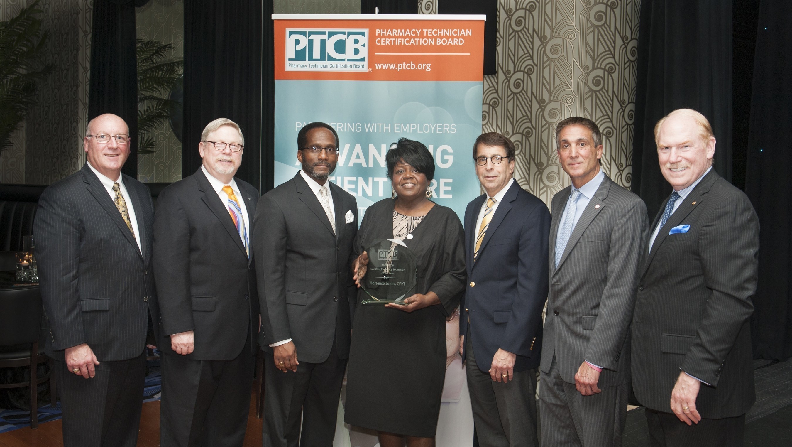 Members of PTCB's Board of Governors recognize 2015 CPhT of the Year Hortense Jones at PTCB's twentieth anniversary celebration.