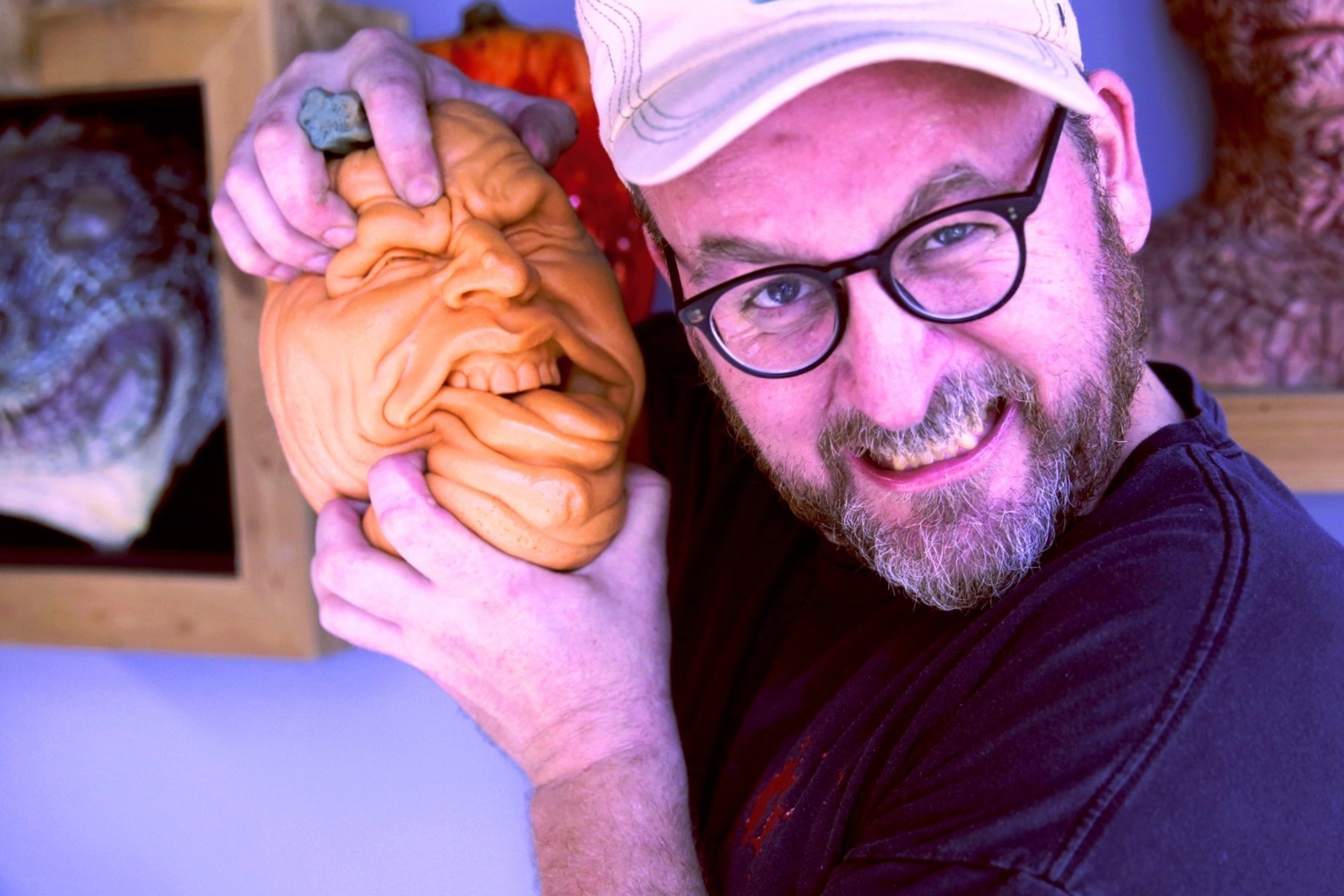 Hollywood Special Effects Artist Todd Masters Poses With One Of His "Oh Lantern Family" Halloween Pumpkin Toys