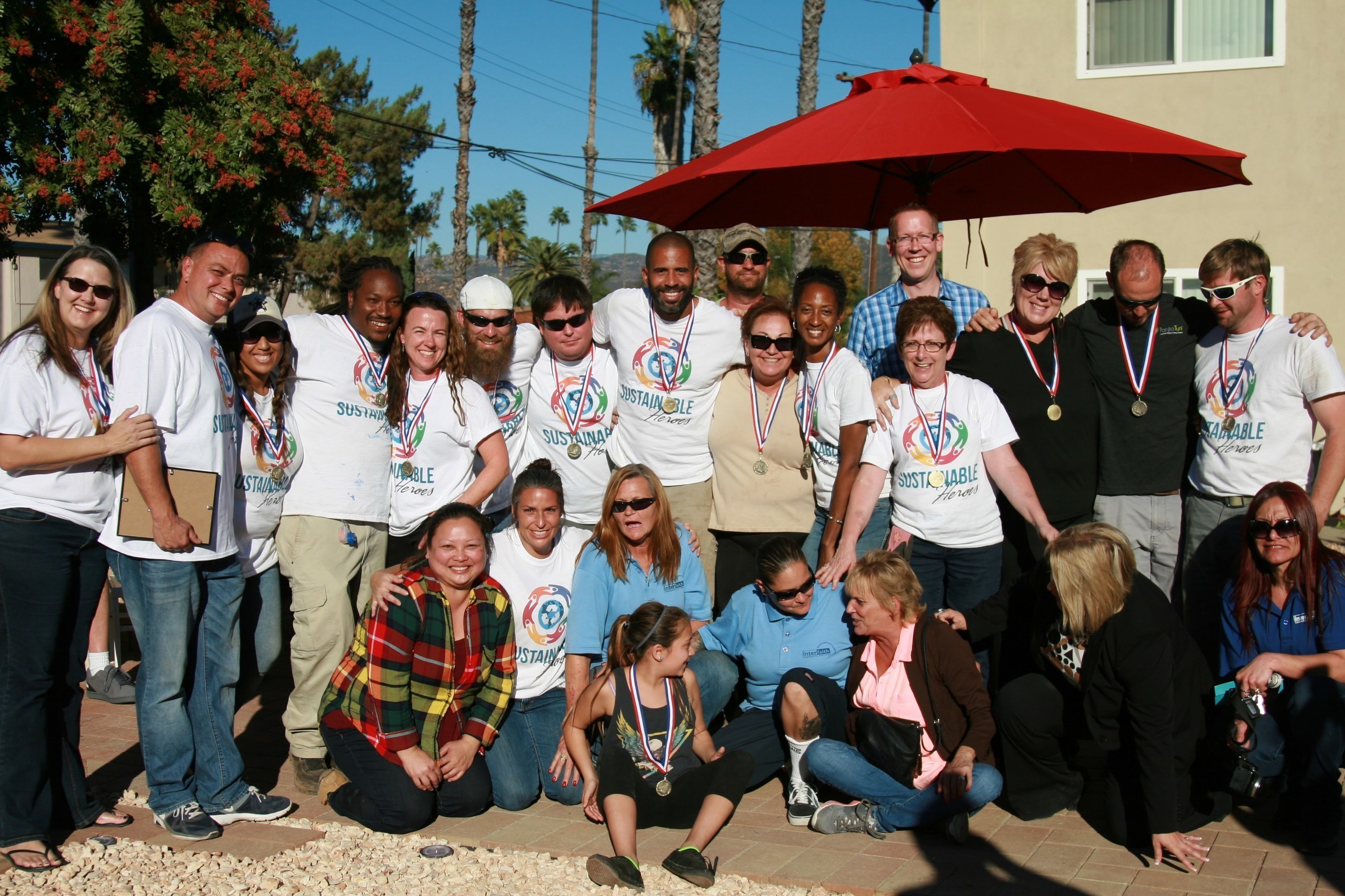 Sustainable Heroes Team Members with Interfaith Community Services partners at the Astor Street Gardens project in Escondido, California.