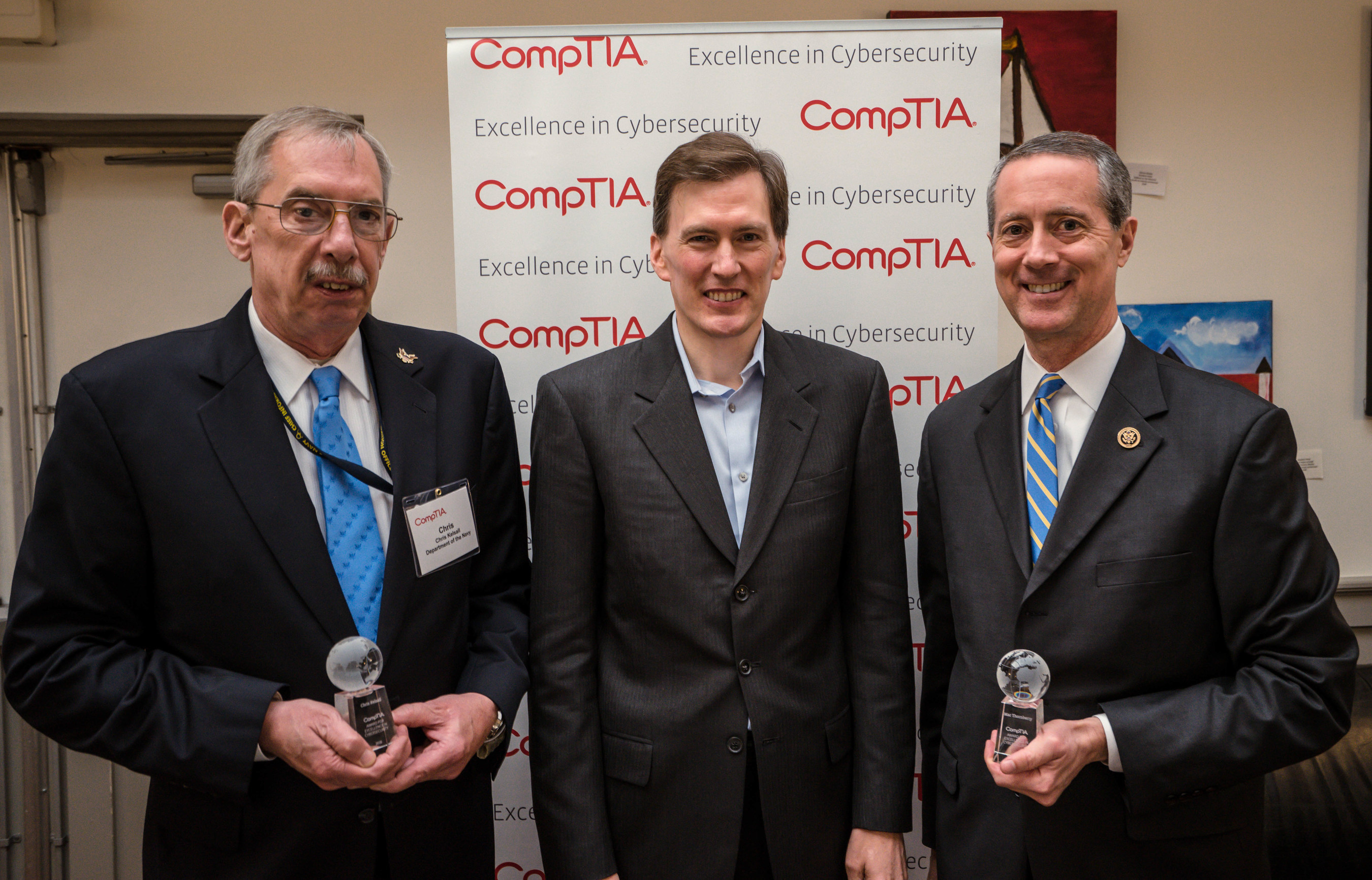 A Texas congressman and a federal agency program manager who have promoted the wise use of federal dollars to improve the cybersecurity skills of those who work for the U.S. government were honored Tuesday by the Computing Technology Industry Association. The 2016 CompTIA Excellence in Cybersecurity awards were presented to Chris Kelsall (left), Branch Head, Cyber Workforce, U.S. Navy, and Congressman Mac Thornberry (TX-13) (right), Chairman House Armed Services Committee. Todd Thibodeaux (center), president and CEO of CompTIA, presented the awards during a ceremony in Washington, D.C.