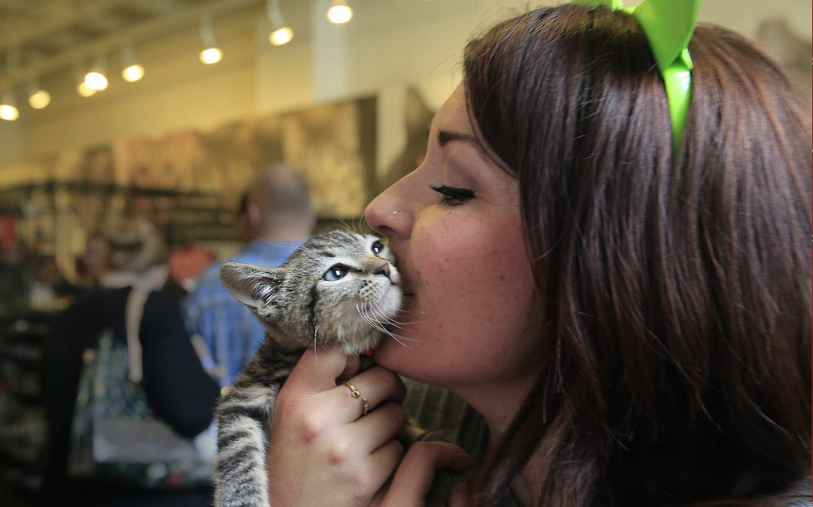 A new adoptee at the 2015 CatConLA event.