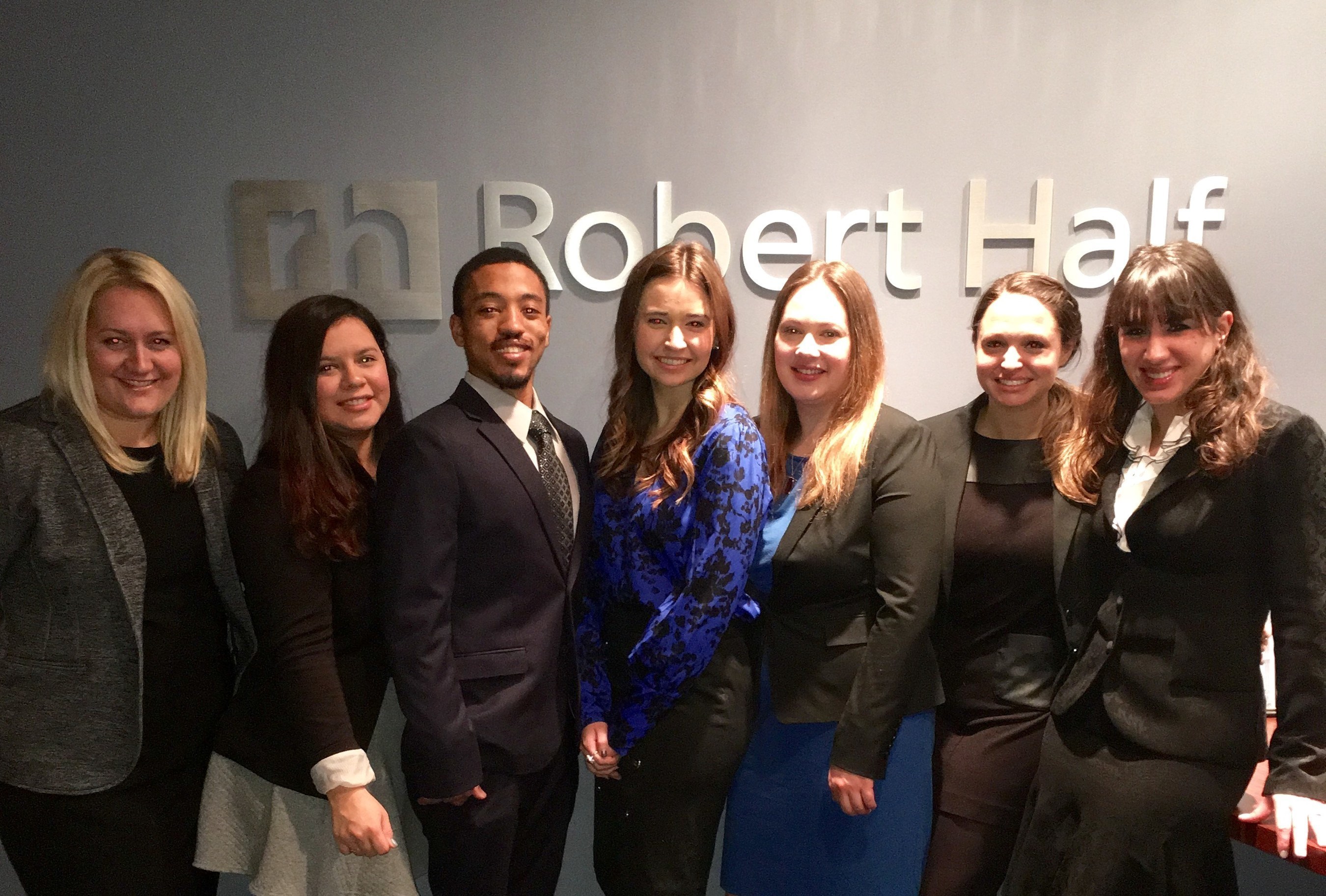 The Robert Half Legal Chicago North Team. From left to right: Kirby Grossman, Monique Cornelio, Anthony May, Katie Hoffman, Jenni Betts, Marisa Sniff and Daisy Chase.