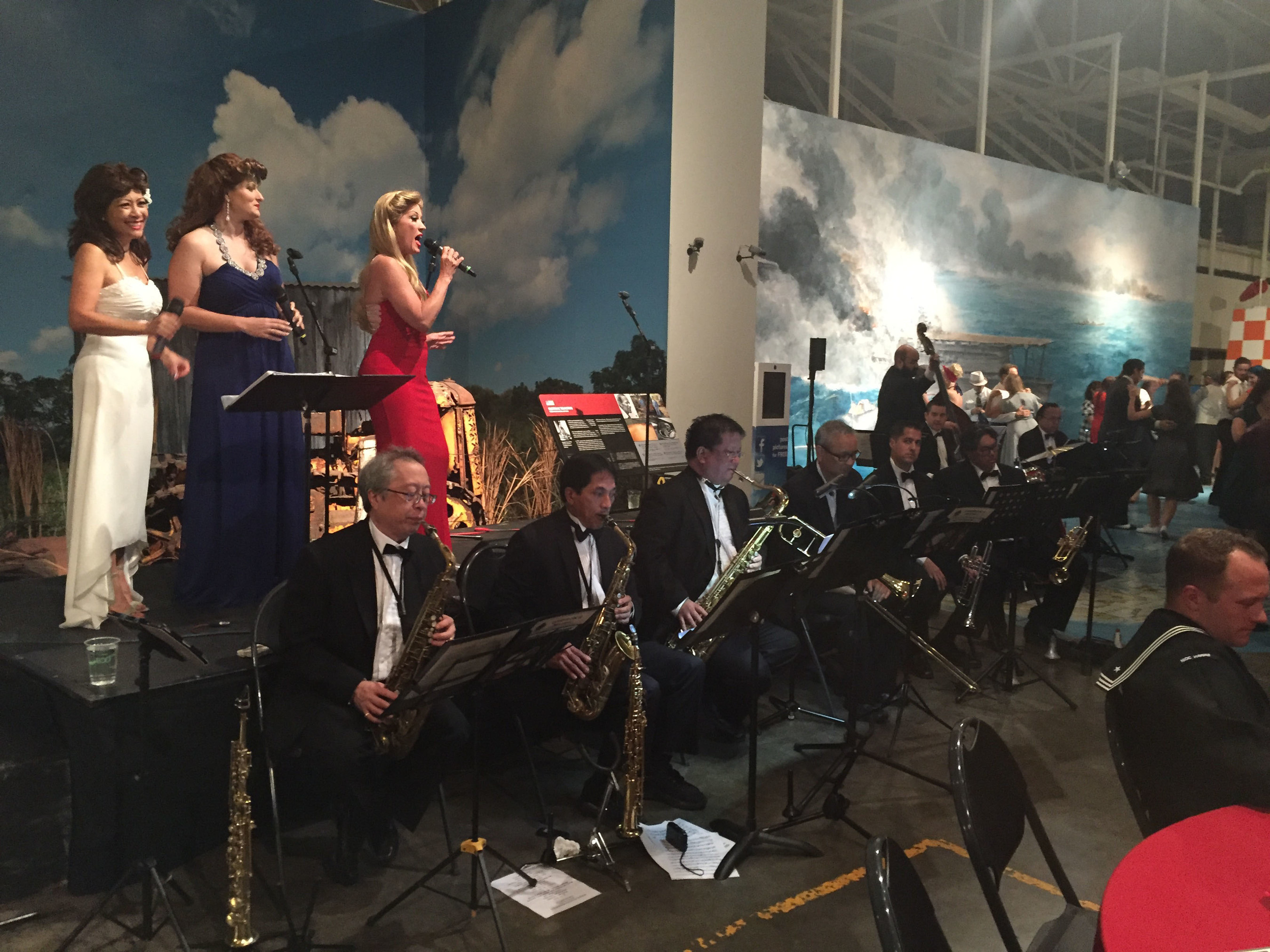 Injured service members and their families enjoy swing music at 1940's themed event.