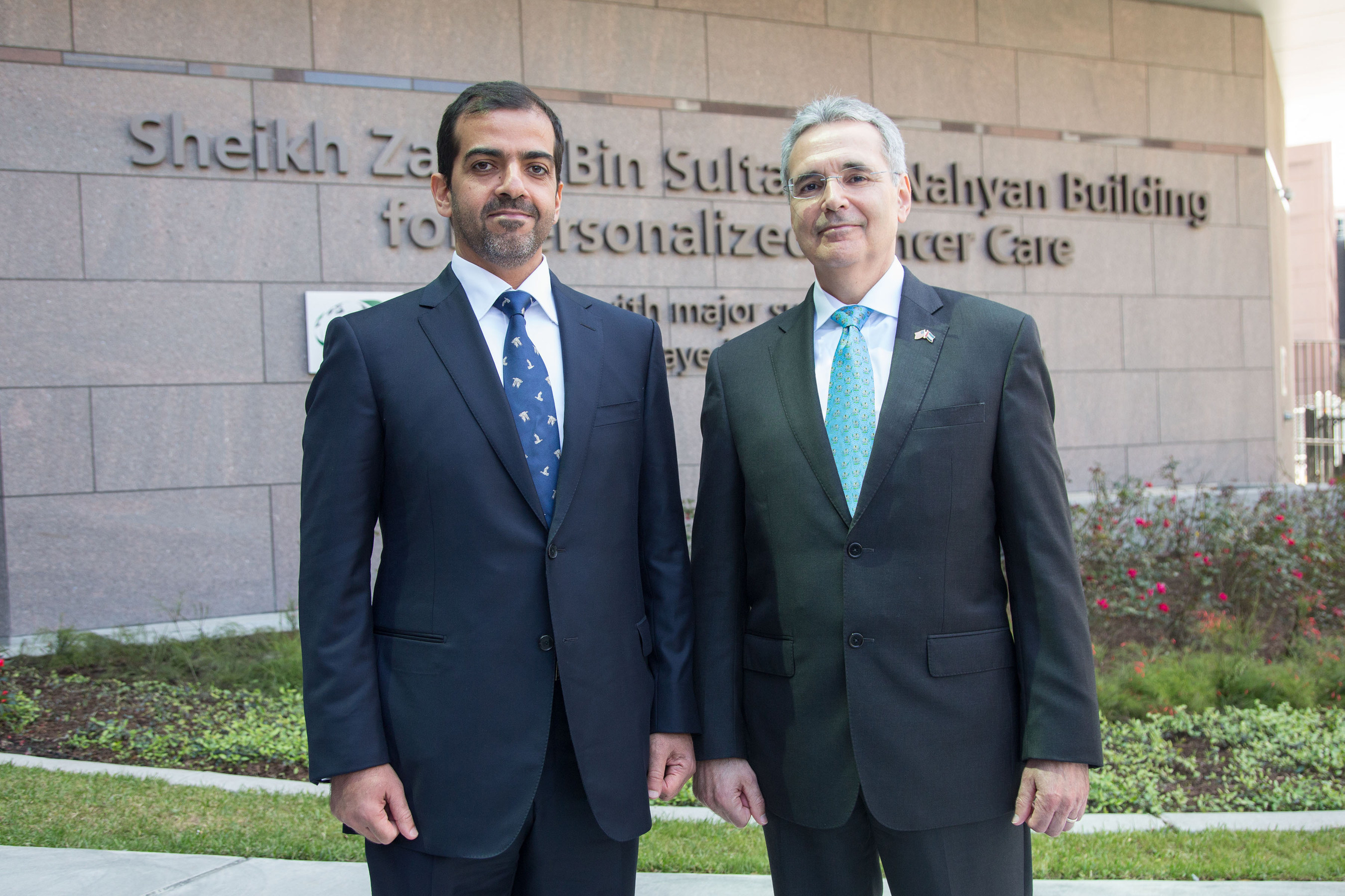 His Highness Sheikh Hamed Bin Zayed Al Nahyan, Chairman of the Crown Prince Court of Abu Dhabi, left, and Ronald A. DePinho, President, The Universty of Texas D Andreson Cancer Center, pose for a photo in front of the Sheikh Zayed Bin Sultan Al Nahyan Building for Personalized Cancer Care, after the center was dedicated Friday, April 8, 2016