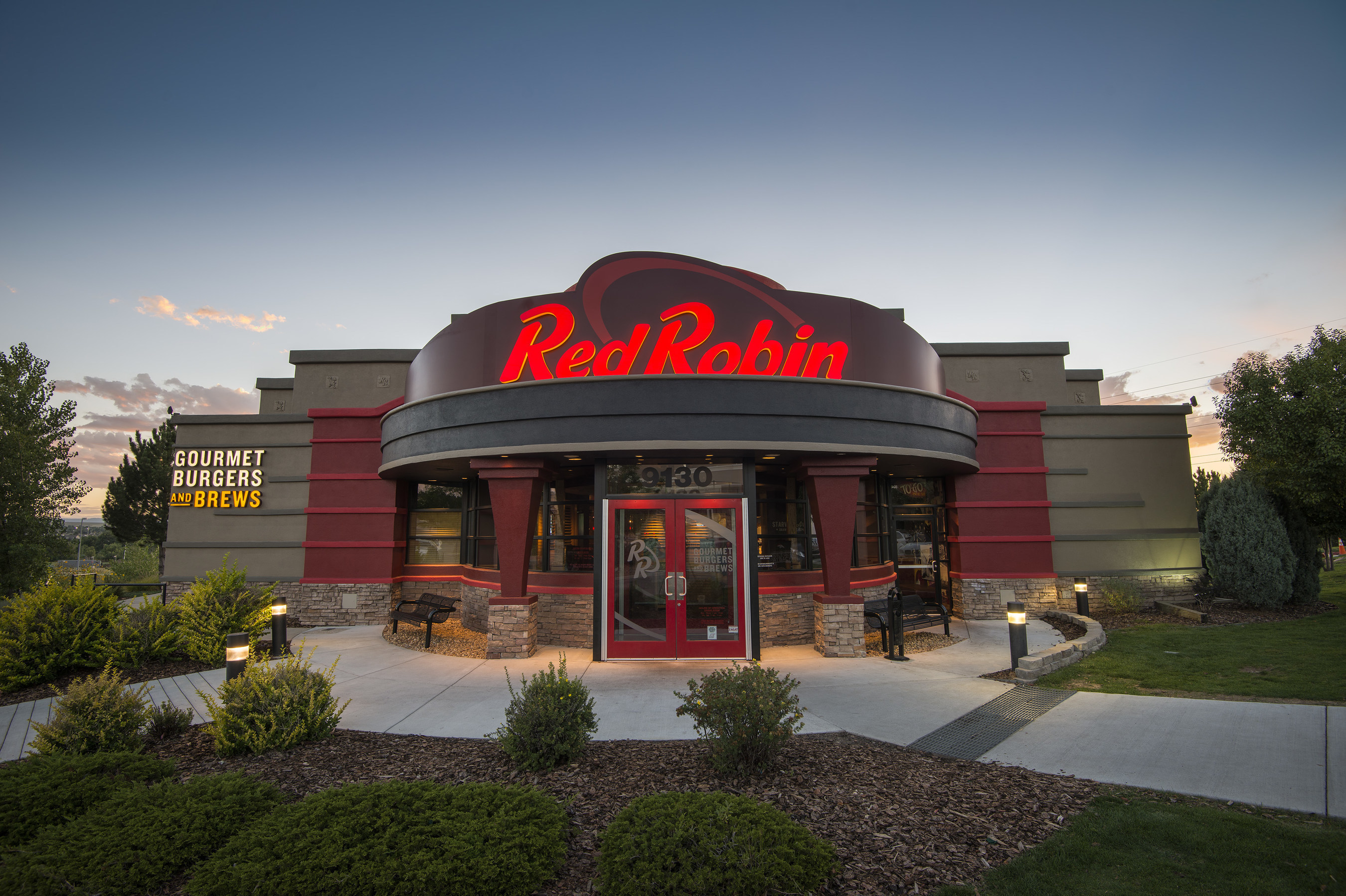 Red Robin Gourmet Burgers and Brews restaurant exterior. Red Robin Gourmet Burgers and Brews is a casual dining restaurant chain famous for serving more than two dozen craveable, high-quality burgers with Bottomless Steak Fries(R) in a fun environment welcoming to guests of all ages.