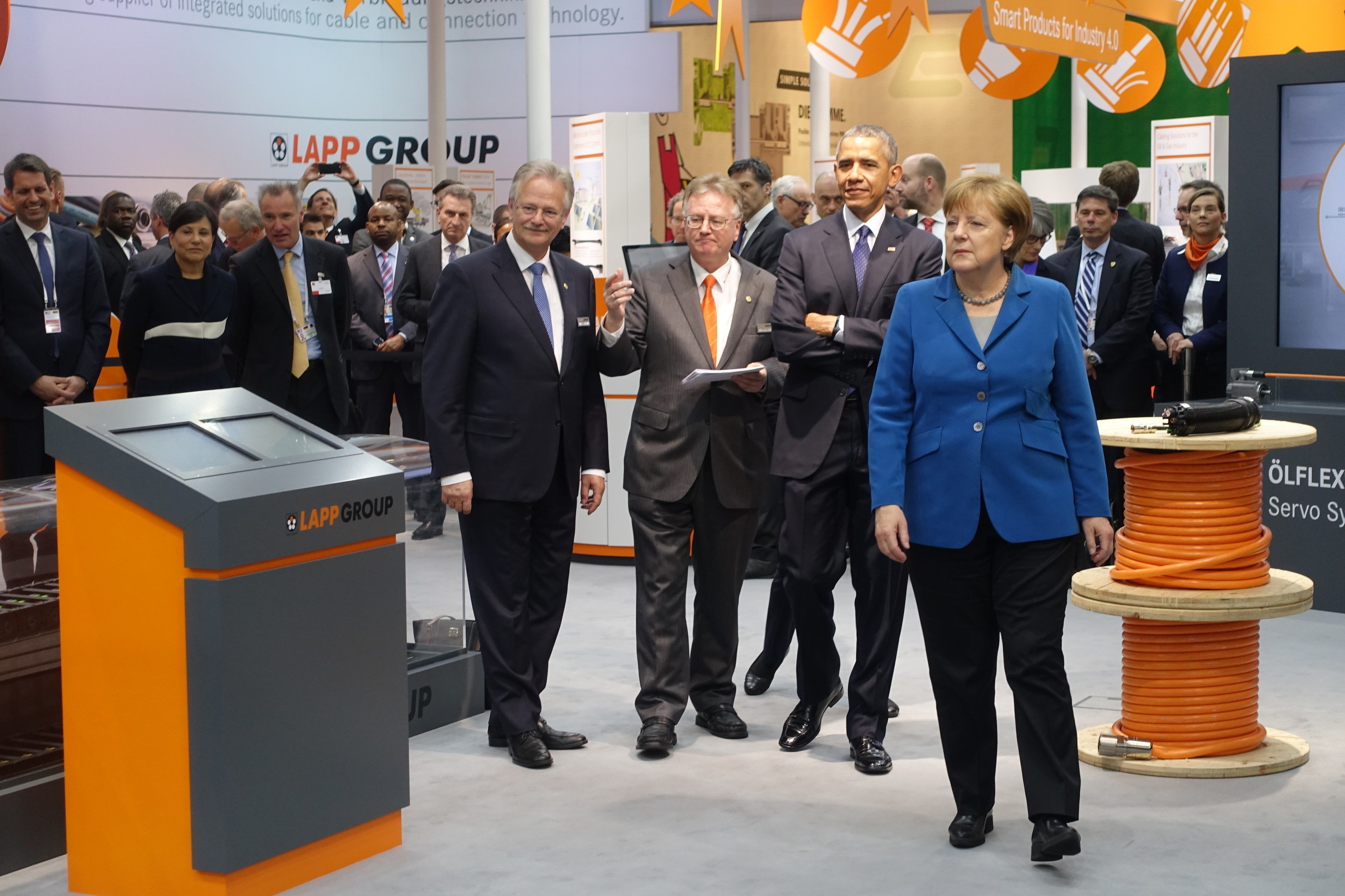 Andreas Lapp and Siegbert Lapp of the Lapp Group meet President Barack Obama and Chancellor Angela Merkel at the Hannover trade fair for industrial technology.